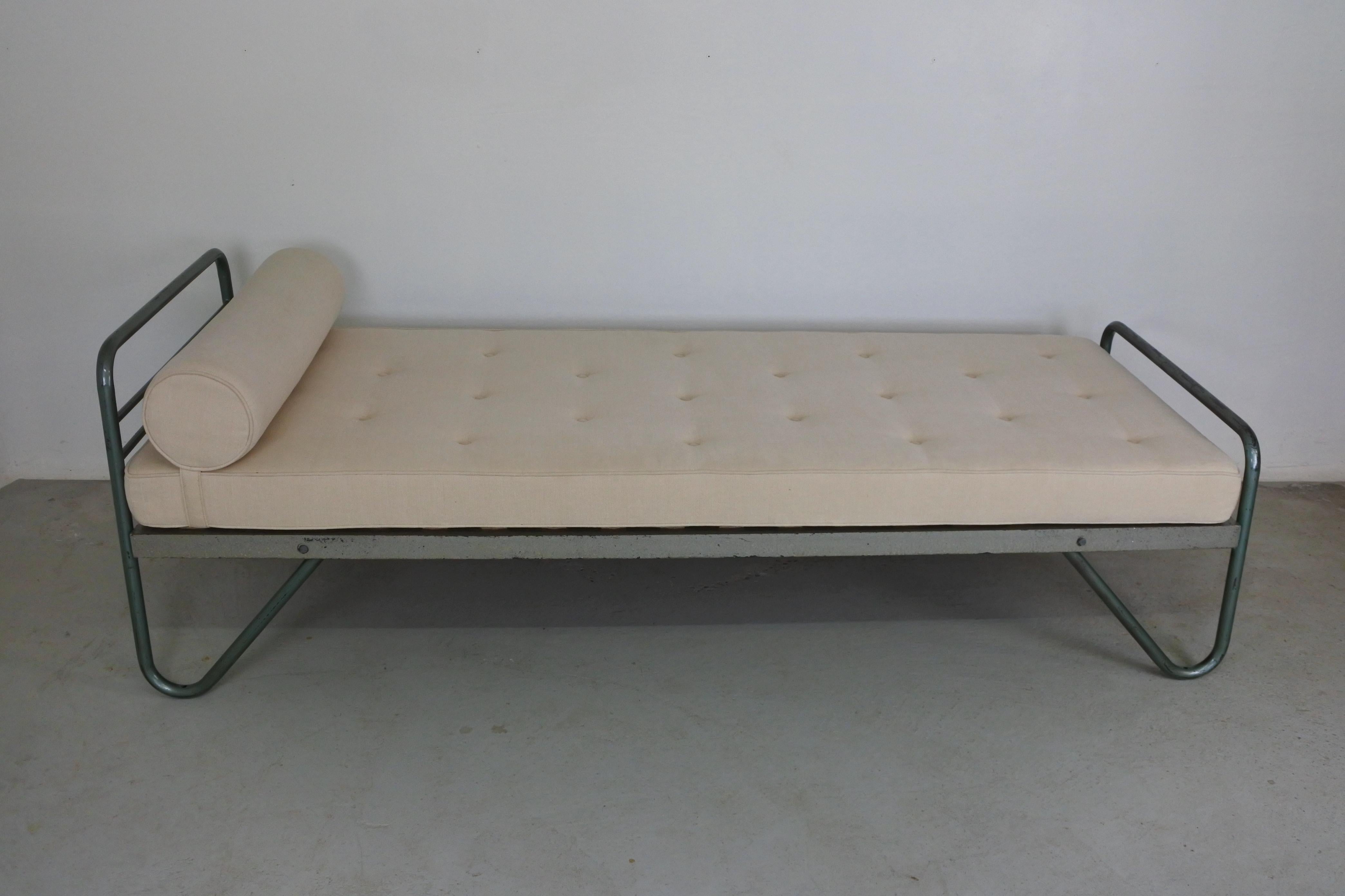 Mid-Century Modern daybed attributed to Jacques Hitier
Tubular lacquered steel with new upholstery
Made in France in the 1950s

Fantastic natural patina from age and use to the tubular steel.