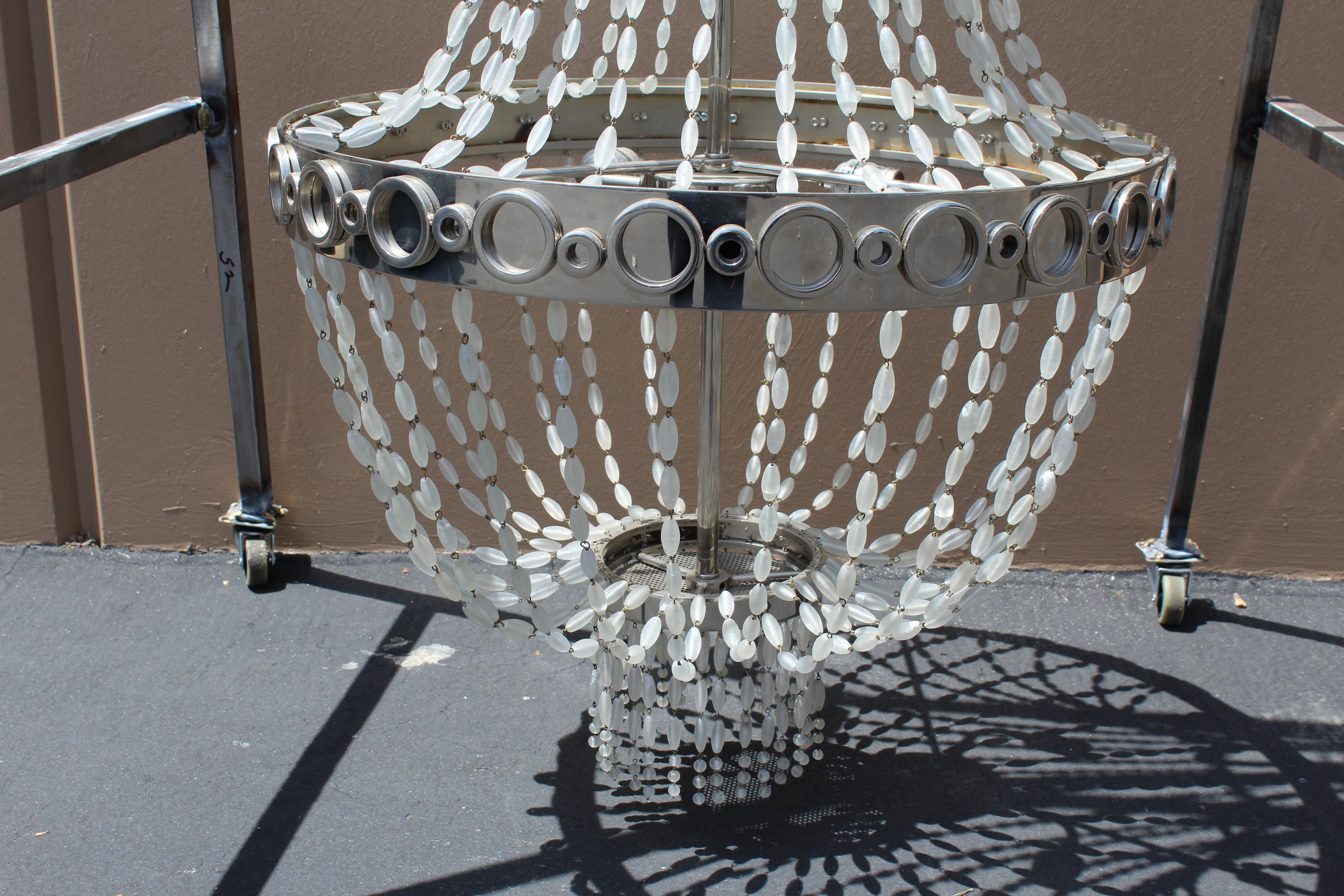Custom designed by a popular designer in Los Angeles . Custom manufactured in a drapery design of Frosted Glass beads . Hand strung on the 24
