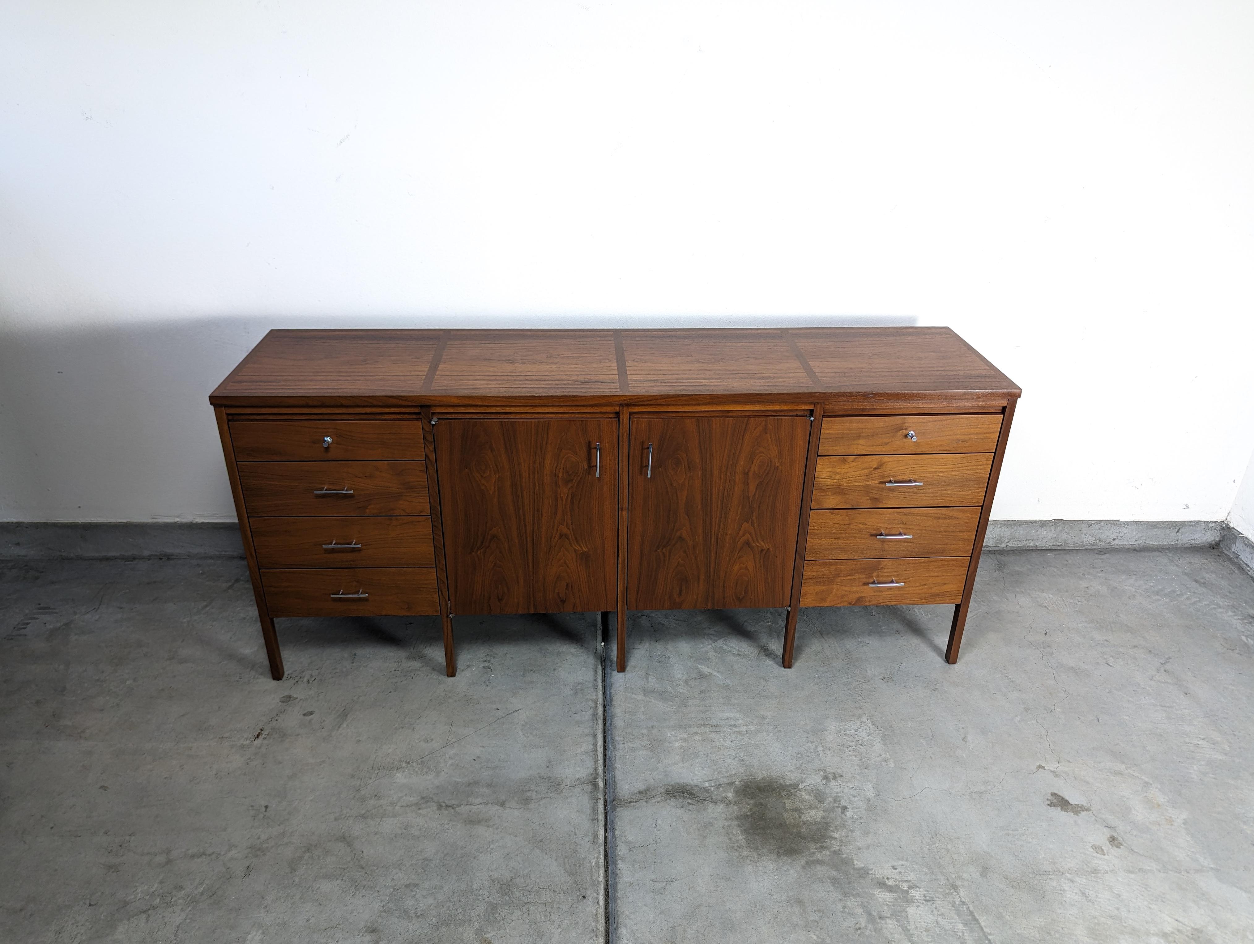 Prepare to fall in love with a piece of history. This stunning and rare mid-century modern dresser is a part of the 