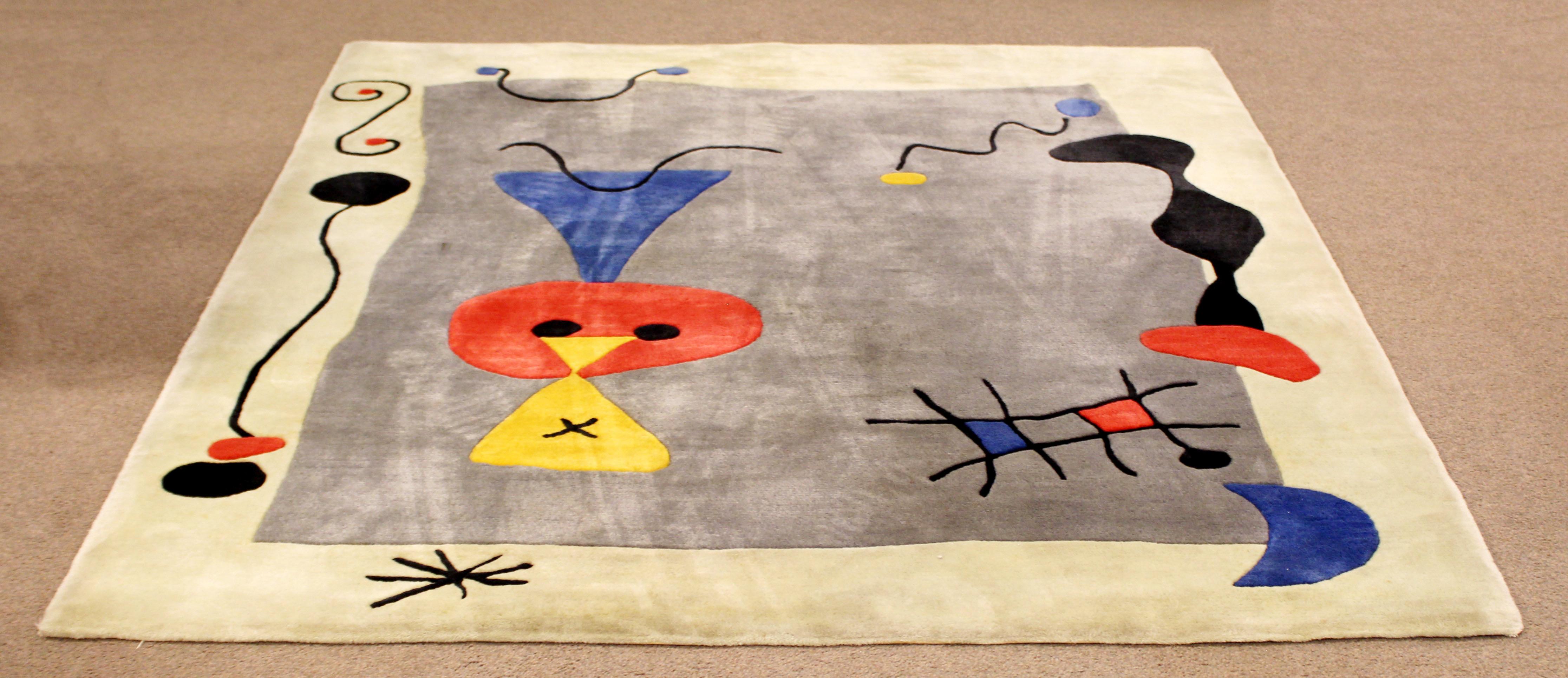 For your consideration is a wonderful, 100% wool, abstract art area rug or wall tapestry Miro design, circa 1960s. In vintage condition. The dimensions are 72