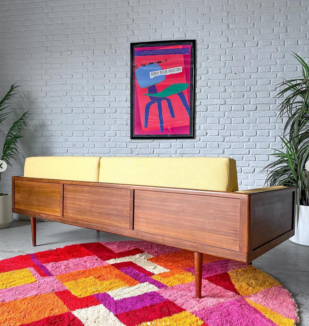 Rare solid walnut case sofa by American designer, Mel Smilow.  Mel Smilow is a lesser know designer from the mid century time period, but he created some amazing minimalist but beautifully crafted designs.  In our opinion, his work should be revered