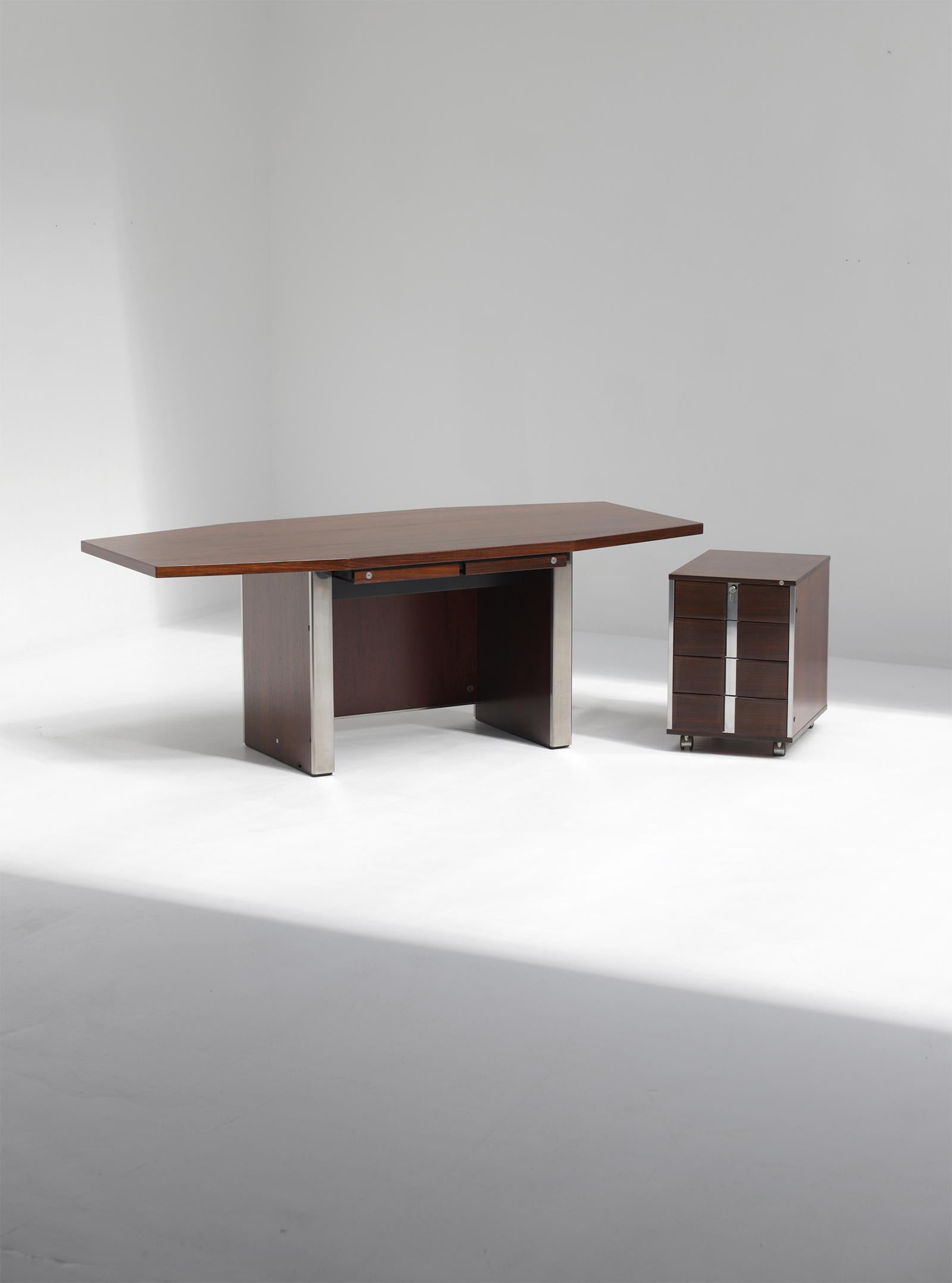 Mid-Century Modern desk by Desk Ennio Fazioli & Ufficio Tecnico for MIM, Italy 1960s. This desk is made of dark warm colored wood and has chrome detailed legs. Under the tabletop you can find 2 small drawers, which contain a stainless steel and