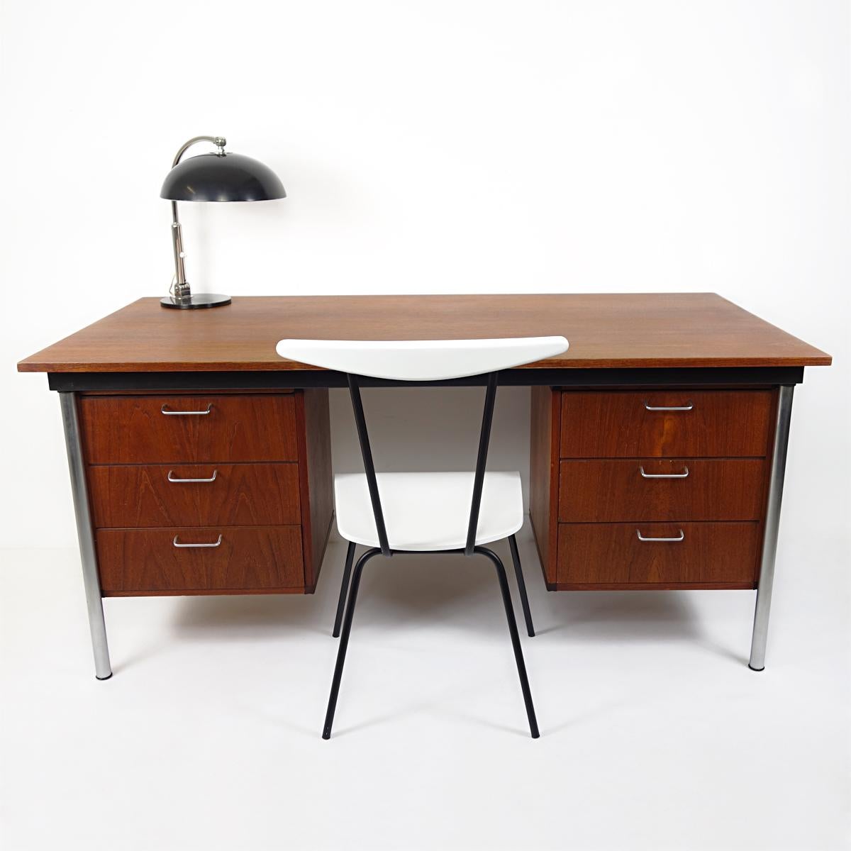 Beautifully designed desk by Cees Braakman for Pastoe with high levels of practicality and comfort.
It has six drawers, three of each side of the seating position. 
The exterior looks are sleek and business like whilst the interior looks very