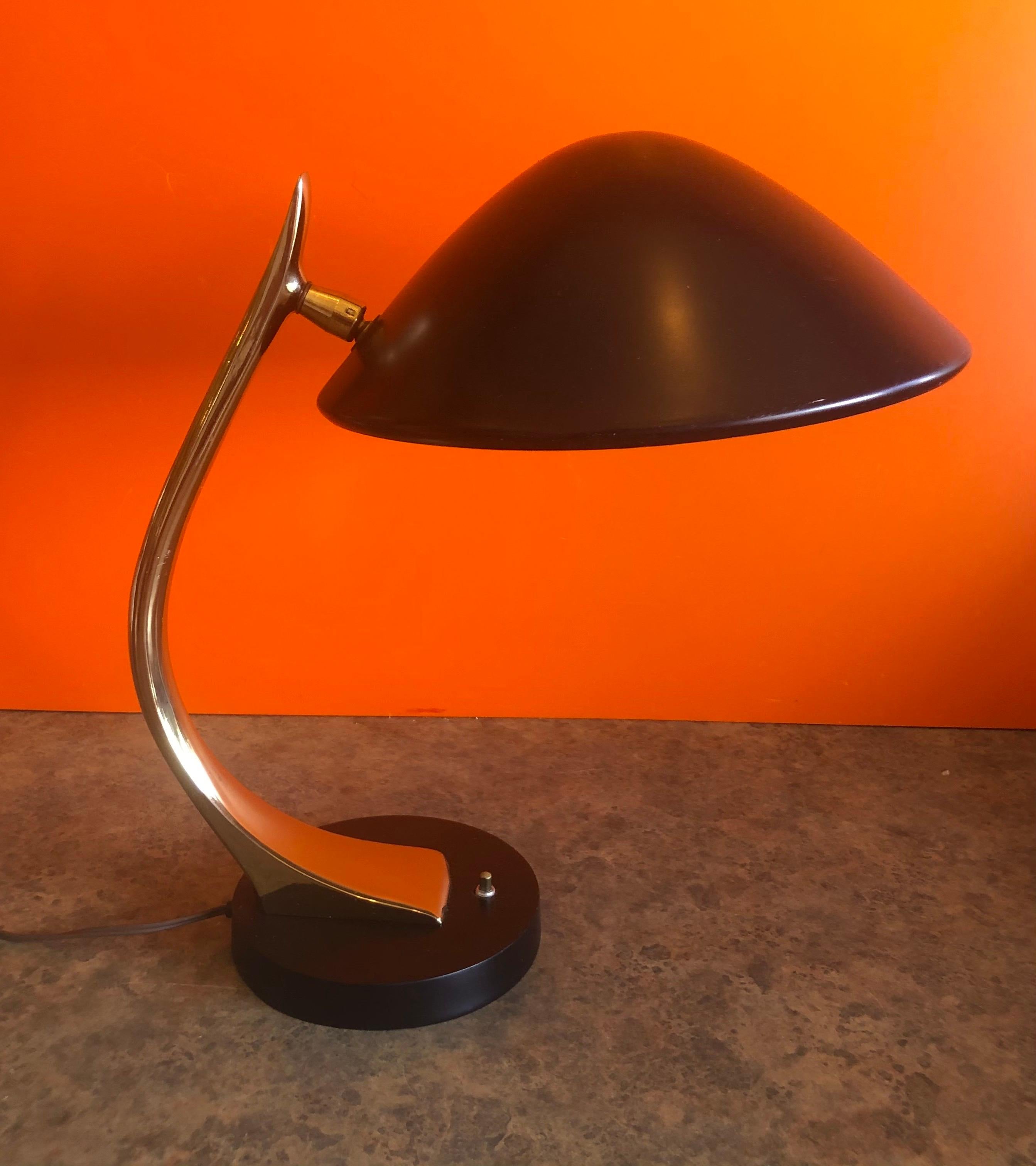 Highly collectible MCM desk lamp by Laurel Lamp Co., circa 1960s. The lamp features a 10