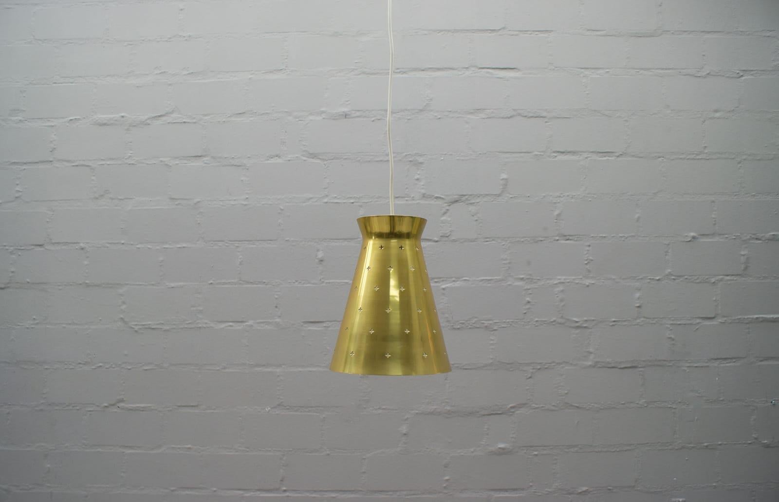 Elegant Mid-Century Modern diabolo pendant lamp. 

Designed and manufactured by Hillebrand Leuchtenfabrik, 1950s, Germany.

Executed in perforated and brass anodized aluminum. 

The lamp needs 1 x E27 Edison screw fit bulb, is wired, and in