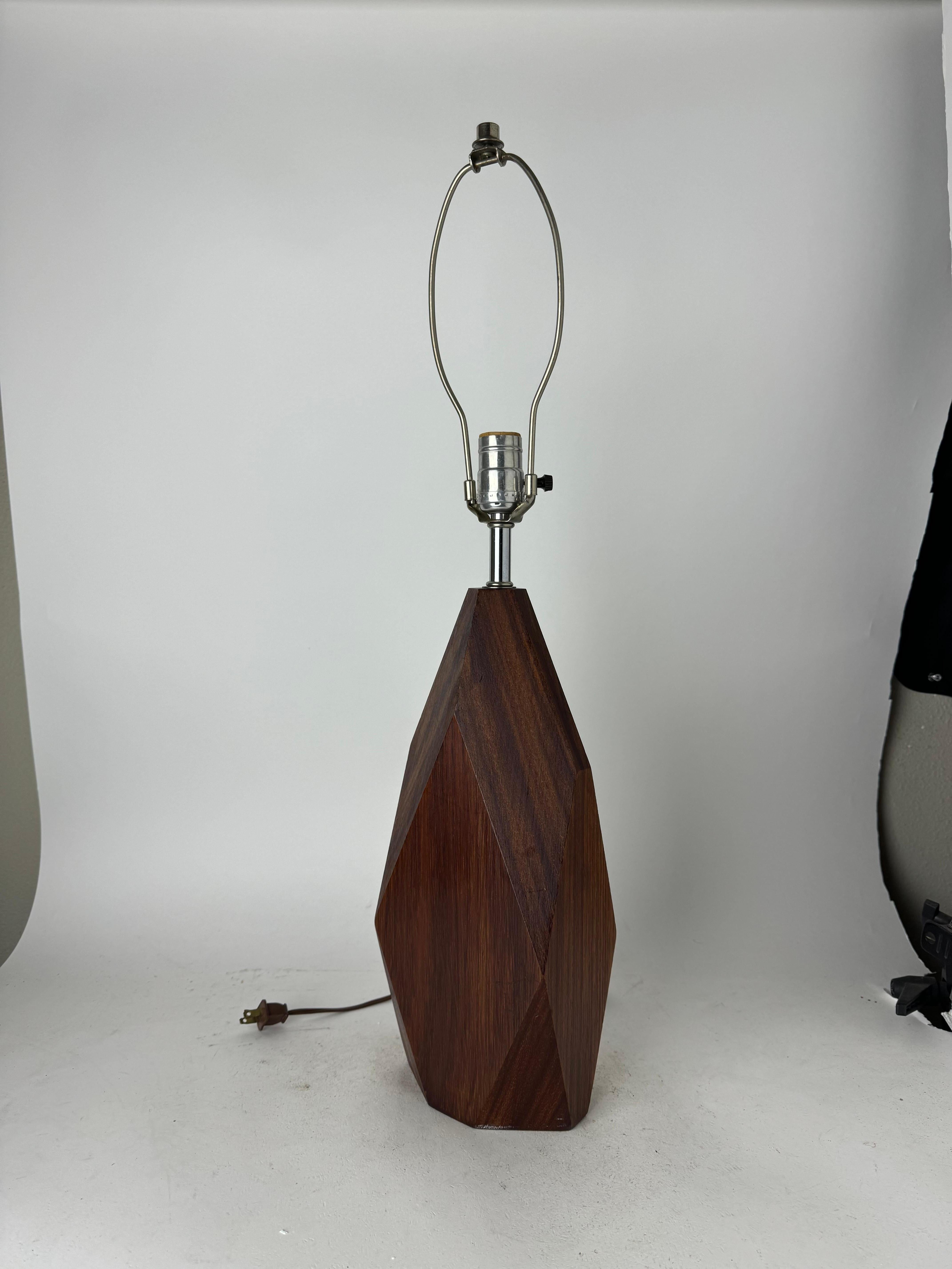 Gorgeous vintage diamond shaped table lamp in teak wood, after the finest Danish Mid Century Modern designs. This mid century modern table lamp comes without a shade. 

There's no designer or maker marks on the lamp.

The teak wooden base stands 15