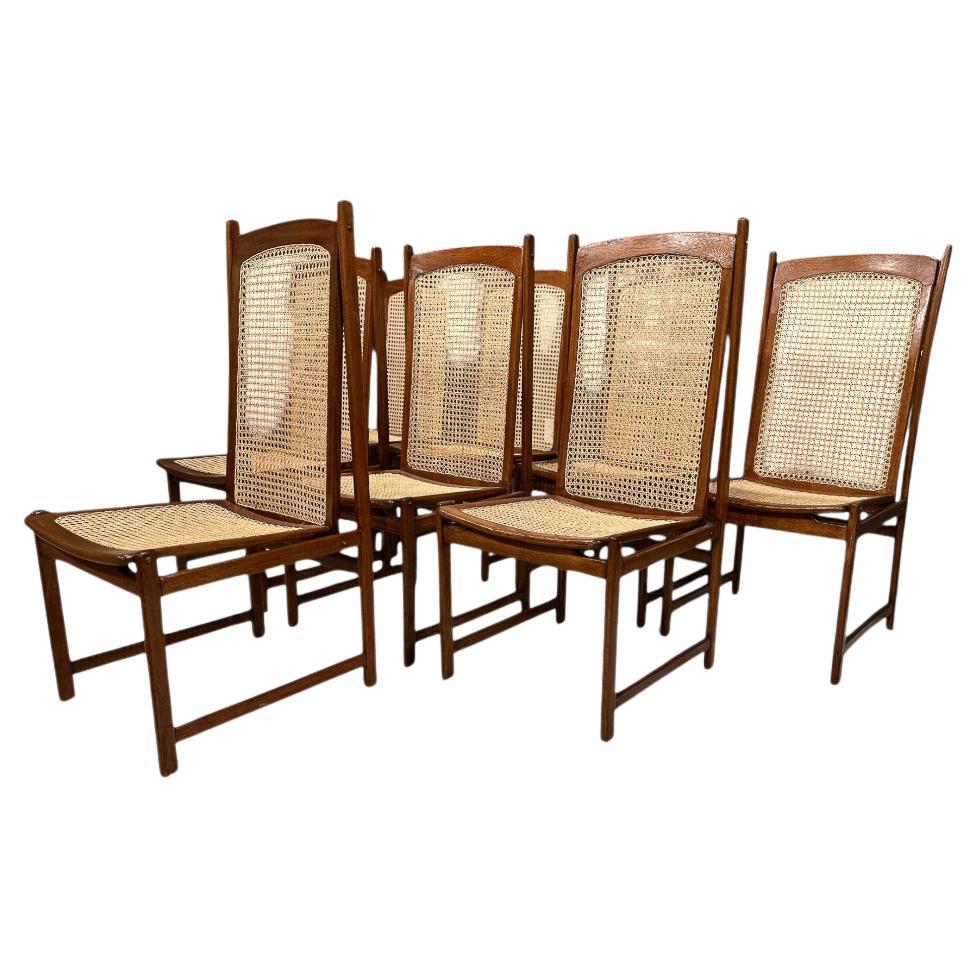 Available today, this spectacular Brazilian modern dining chair set made in Hardwood and Cane, by Celina Decoracoes, in the sixties is nothing less than spectacular.
 
Each chair features a Cerejera wood structure with four legs, curved seat and a