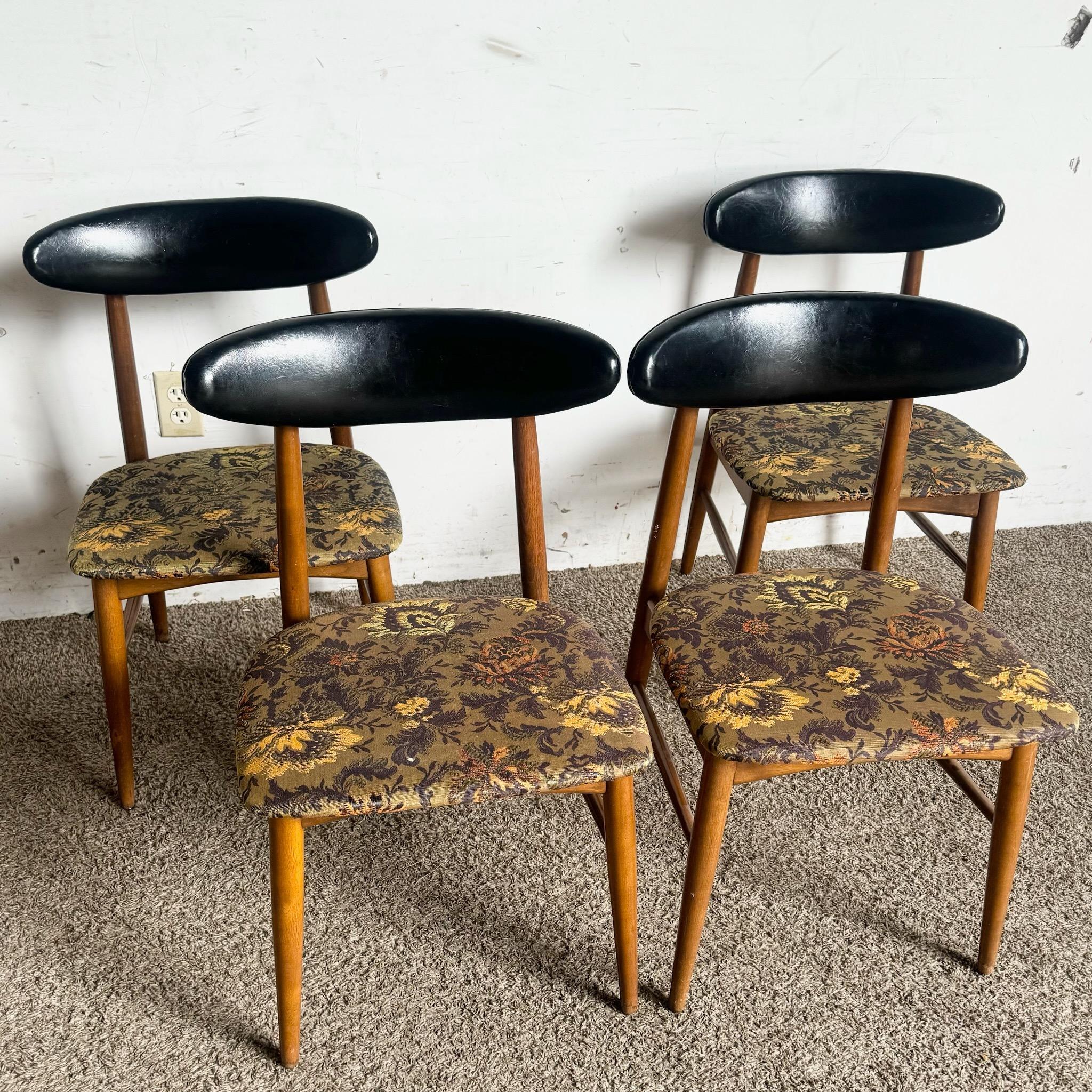 This set of 4 Mid Century Modern Dining Chairs by Baumritter adds timeless elegance to your dining space. Featuring sleek lines and sturdy craftsmanship, these chairs are perfect for both daily use and special gatherings.
