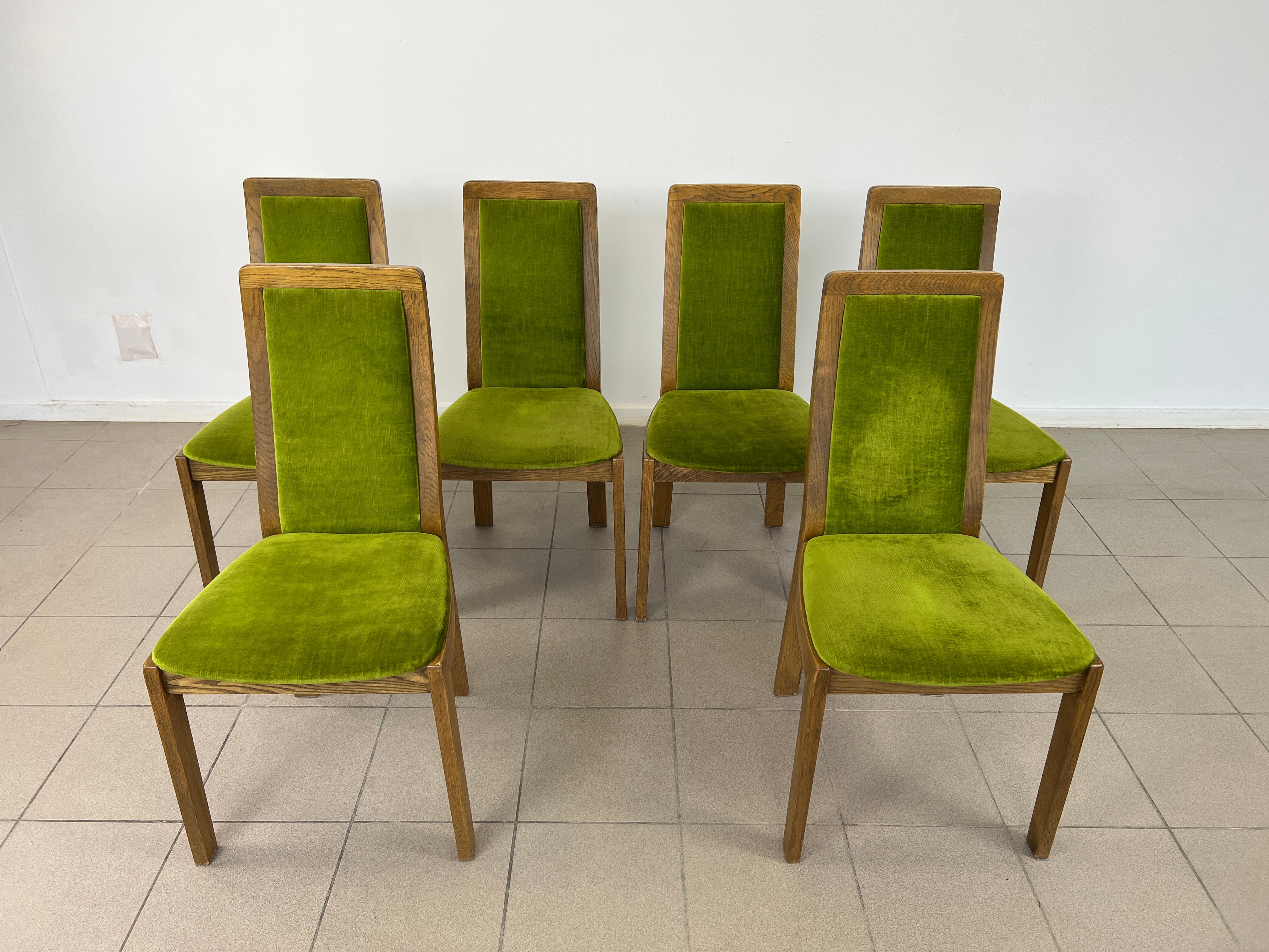Dimensions: H 36.5” x W 17” x SD 15.5” x SH 18”

Set of 6 Mid-Century Modern Scandinavian dining chairs with high backs. Upholstered in original green mohair type fabric. Solid wood frames and legs. The chairs have straight, brutalist clean lines