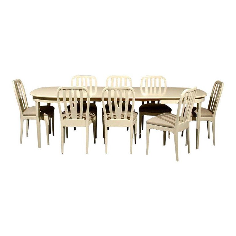 Beautifully restored Swedish Modern Gustavian style vintage dining table by renowned Swedish furniture designer Carl Malmsten.

Oval table expands from dimension of 53 3/4 W x 35 1/2 D x 29 1/4 H in. to 96 3/4 inches in length with the addition of
