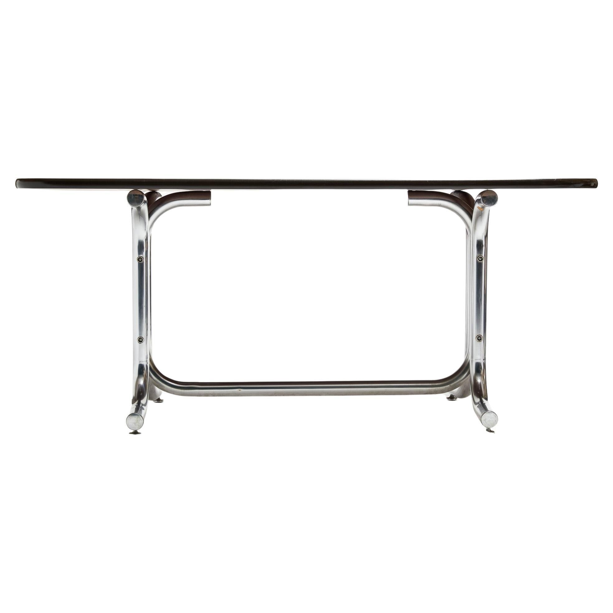 Available today, this midcentury dining table with chrome tubular base and wood is a showstopper! The wood has been refinished, the metal cleaned up and the overall piece is in excellent condition. The table fits 4-6 people comfortably as shown in