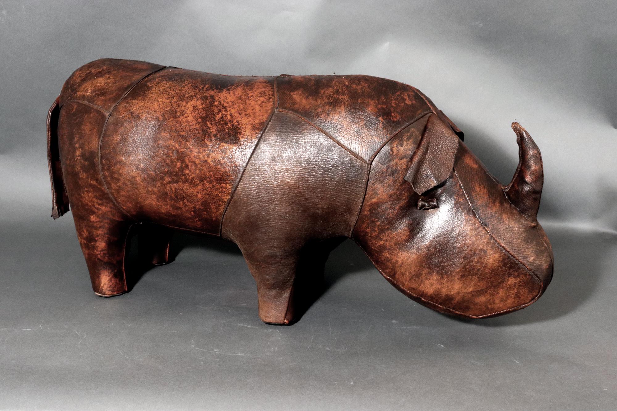 MCM Vintage Leather Rhino Footstool or Ottoman,
The 1960-70s

The Mid-century leather footstool or ottoman is designed in the shape of a Rhino in beautiful dark leather.

Dimensions: 12 1/2 inches high x 29 inches long x 9 inches wide