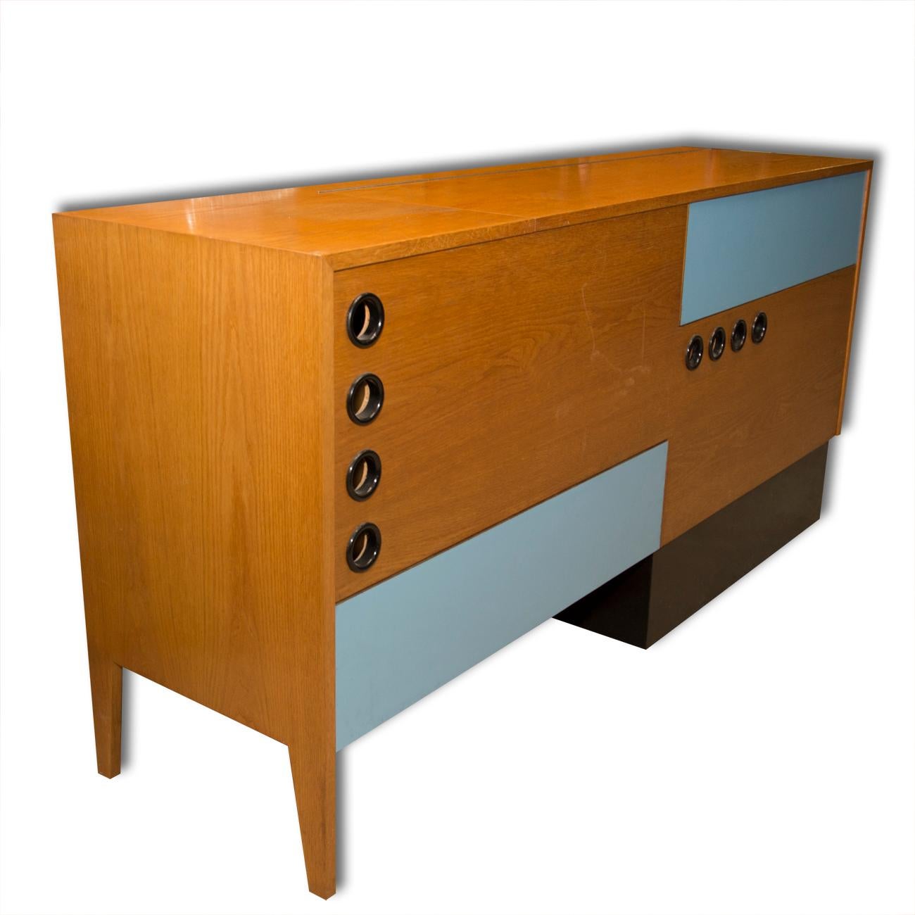 A very interesting model of the midcentury dresser. It was produced in Czechoslovakia in the 1960s and its design is inspired by the so-called Brussels period, connected with the world-famous exhibition EXPO 58.
It is made of beechwood, plywood,