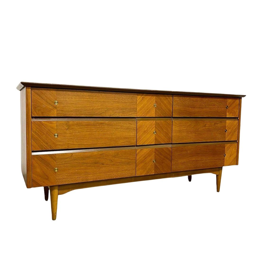 Beautiful mid century dresser set. This set is in incredible condition and a true sight to see. Solid walnut build. Beveled tops. All drawers slide effortlessly. 9 drawer lowboy. 4 drawer Highboy with the top drawer being double. Sitting on sturdy