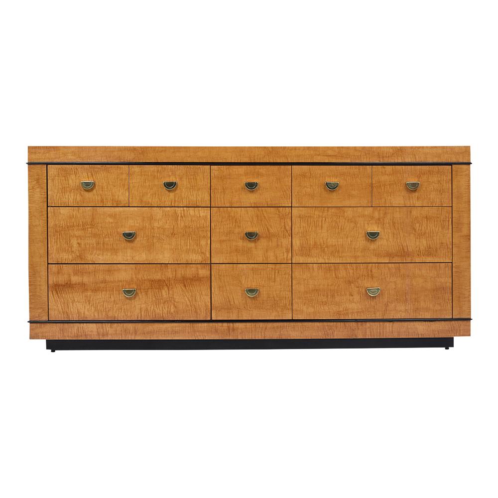This Mid-Century Modern faux birch dresser has been professionally restored, finished in maple, and black color combination with a lacquered finish. This chest of drawers features a total of eleven drawers, organized in a unique layout and all