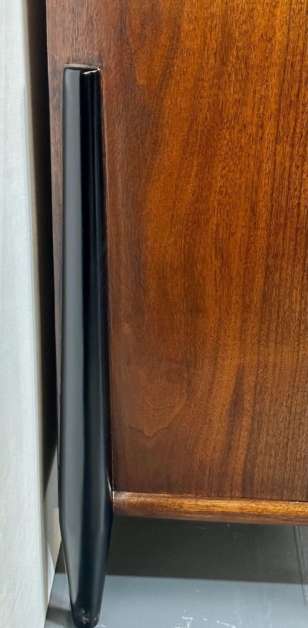 Mid Century Modern Dresser, West Michigan Furniture Co. Ebony, Walnut, Metz
One part of a stunning bedroom set. Fully refinished, finely grained walnut with ebonized columns and restored bronze drawer pulls. This lovely, sleek and stylish dresser