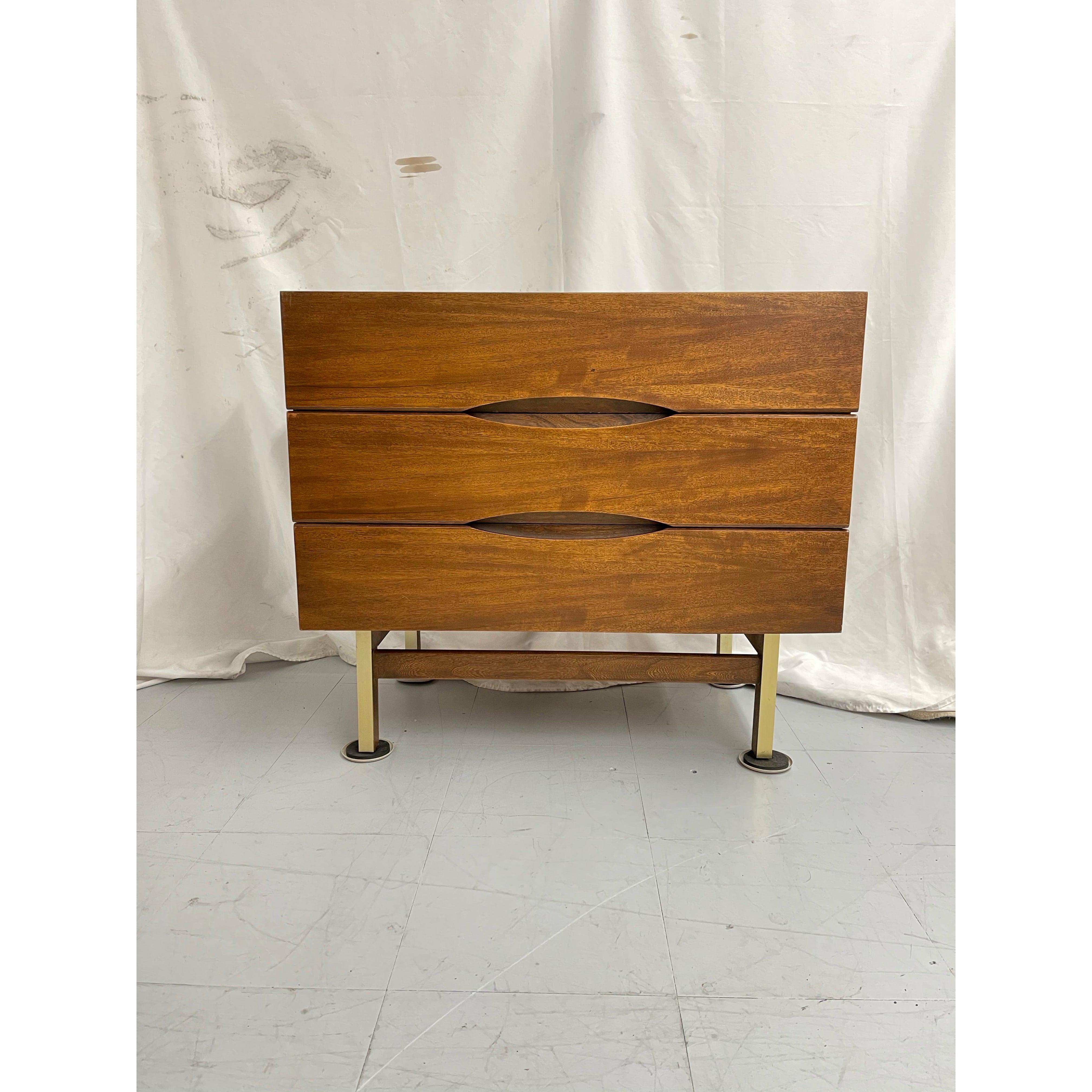 Clean lined 3 drawer dresser form American of Martinsville. Elliptical inset drawer openings and four brass-clad mahogany deeply recessed legs with high set mahogany stretchers.

Dimensions. 34” W ; 19” D ; 30” H
