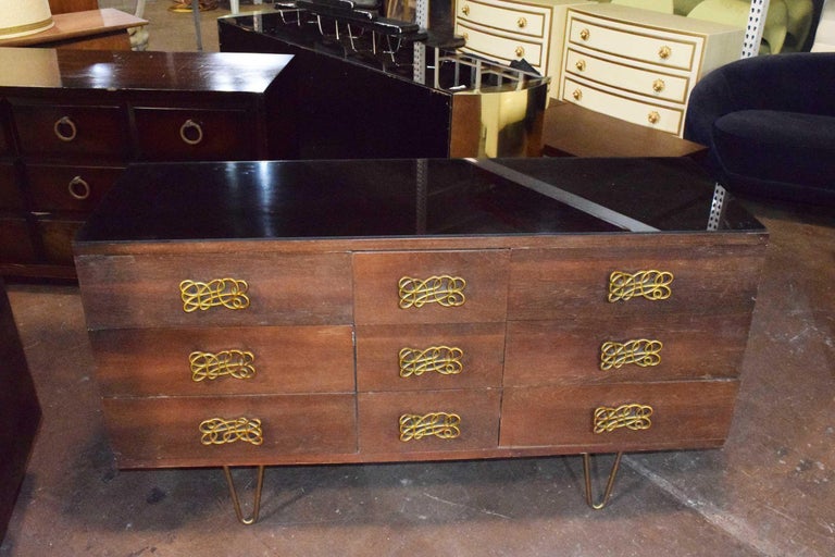 MidCentury Modern Dresser with Large Decorative Pulls and Pin Legs at