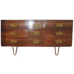 Mid-Century Modern Dresser with Large Decorative Pulls and Pin Legs