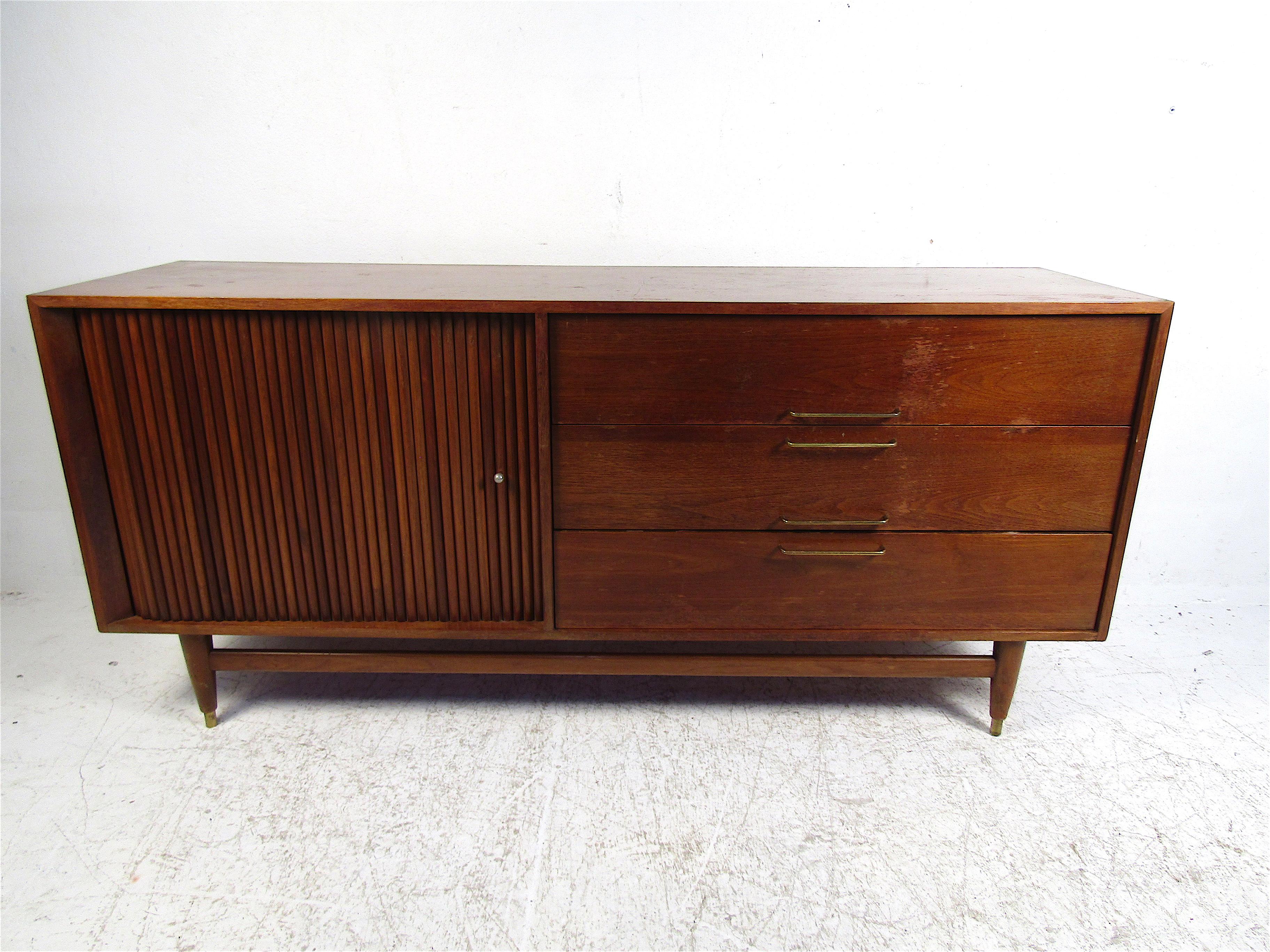 Stylish midcentury dresser with a tambour door and drawers. Well-made piece sure to be a nice addition to any modern interior. Please confirm item location with dealer (NJ or NY).