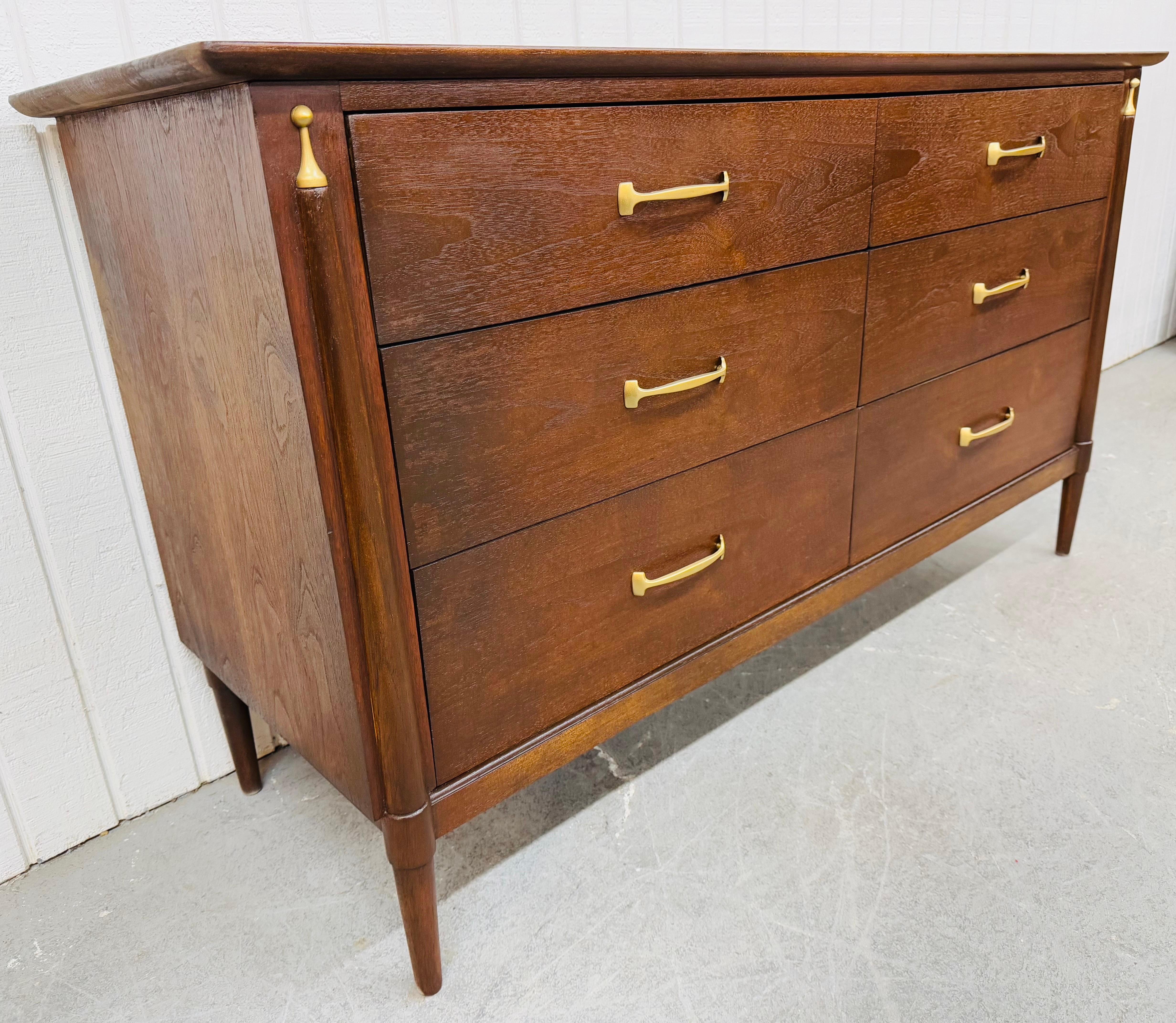This listing is for a Mid-Century Modern Drexel 6-Drawer Walnut Dresser. Featuring a straight line design, six larger drawers for storage, original brass hardware, modern legs, snd a beautiful dark walnut finish. This is an exceptional combination