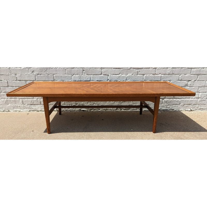 Mid Century Modern Drexel Projection Coffee Table by Kip Stewart

Above average vintage condition and structurally sound. Has some expected slight finish wear and scratching. Has a couple small dings and discolorations on top. Outdoor listing