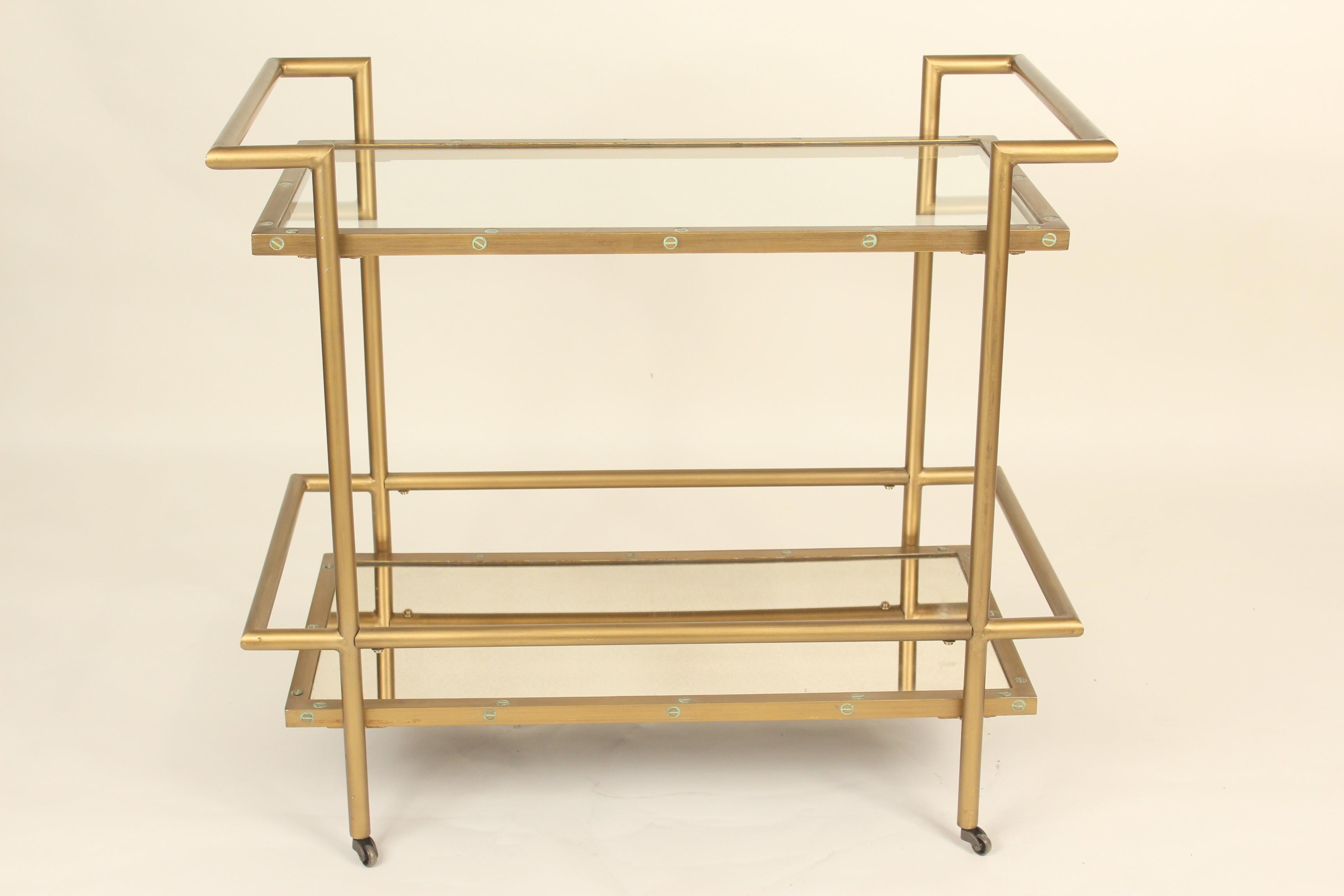 Mid-Century Modern style gilt metal and plexiglass drinks cart, late 20th century. The height to the top of the bar cart handle is 34