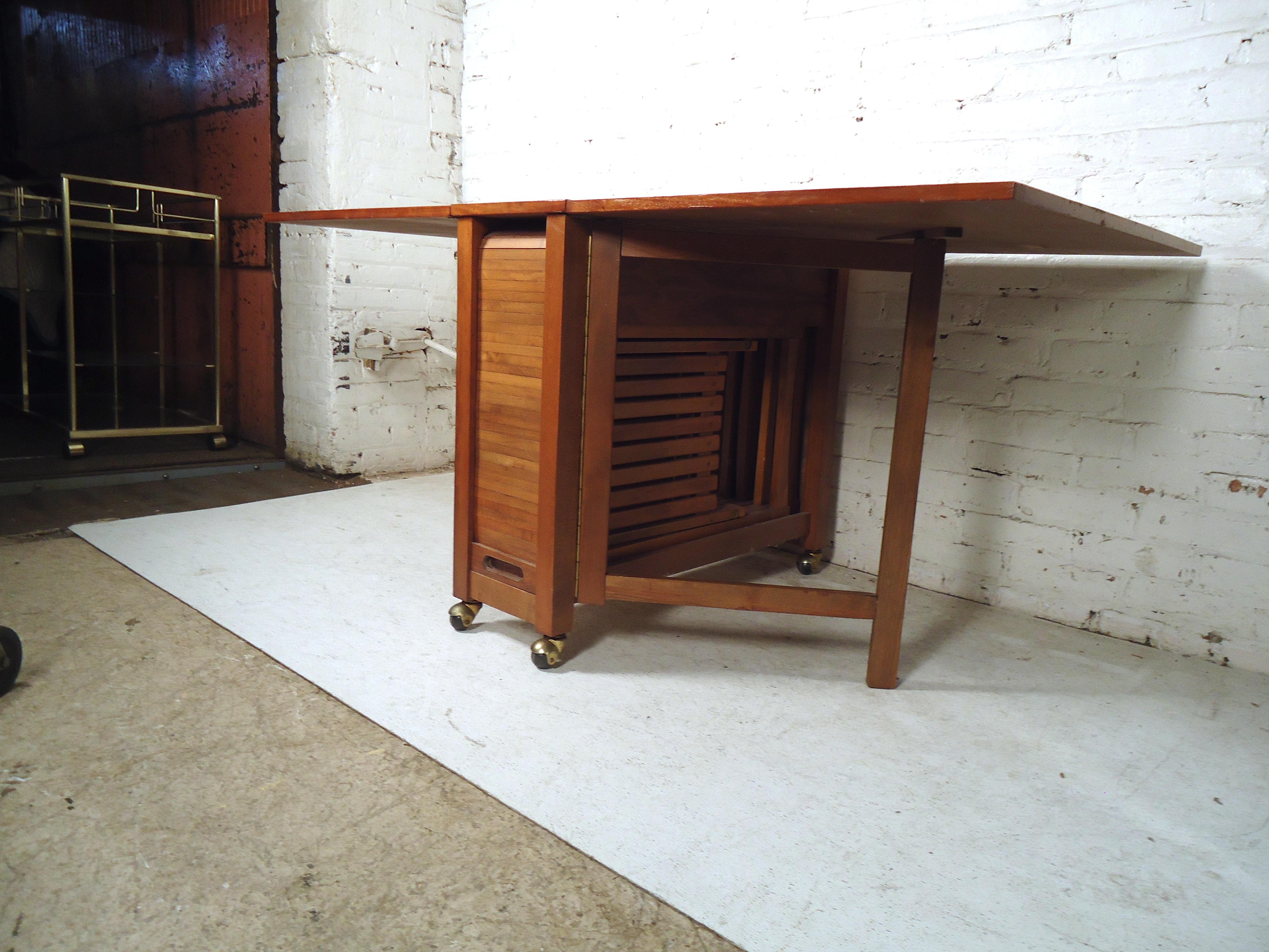 mid-century modern drop-leaf table with chairs