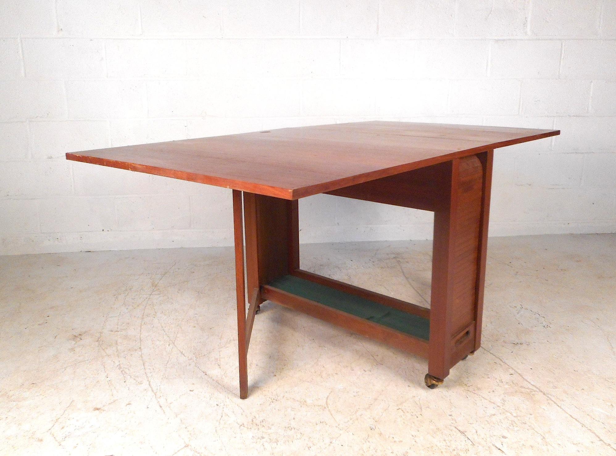 danish modern drop leaf table with folding chairs