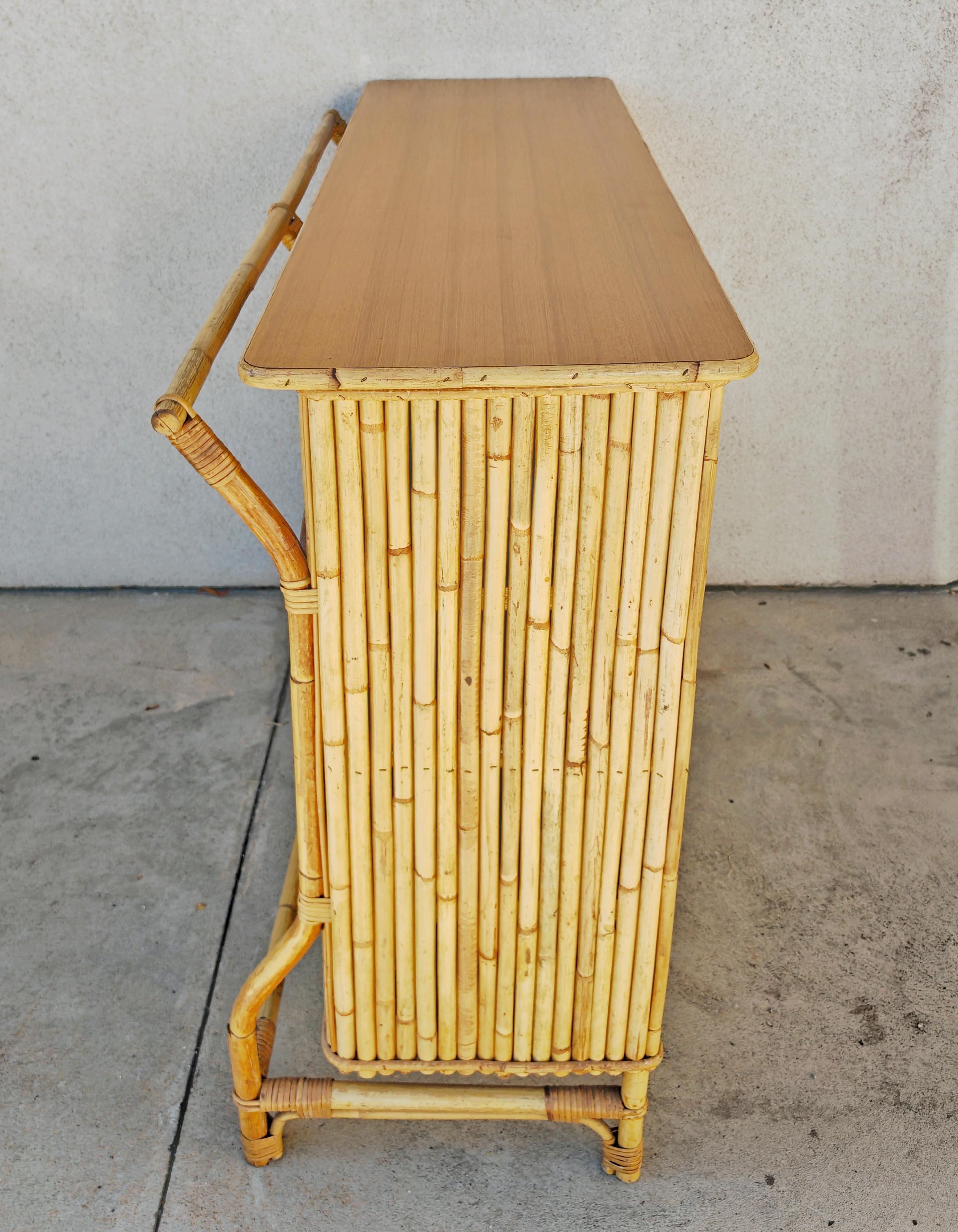 Italian Mid Century Modern Dry Bar done in bamboo, design attr. to Tito Agnoli For Sale