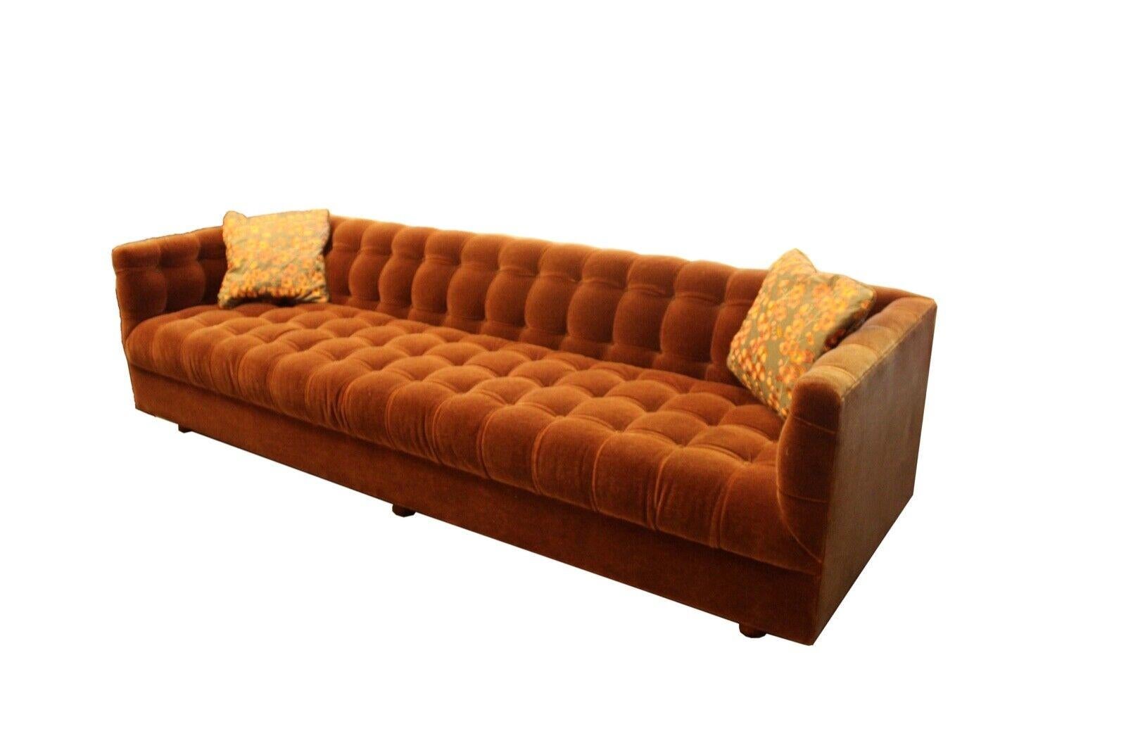 Le Shoppe Too presents this beautiful mohair rust colored tufted sofa attributed to either Harvey Probber or Dunbar. Has slight sun fading on the back of the sofa, shown in pics. In very good vintage condition. Dimensions: 96