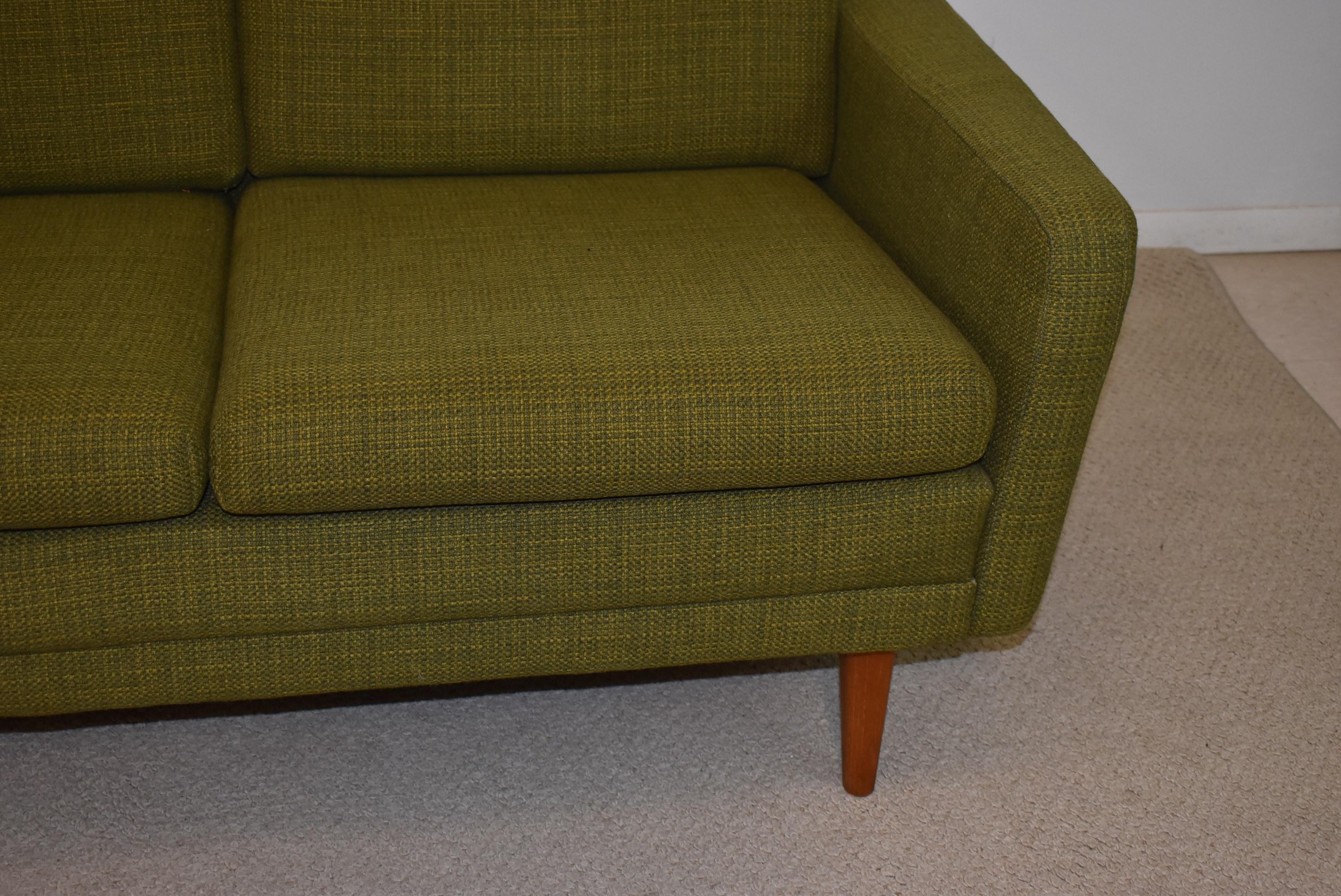 Mid-Century Modern green tweed four cushion sofa by Dux. Original fabric in excellent condition. No stains or wear.