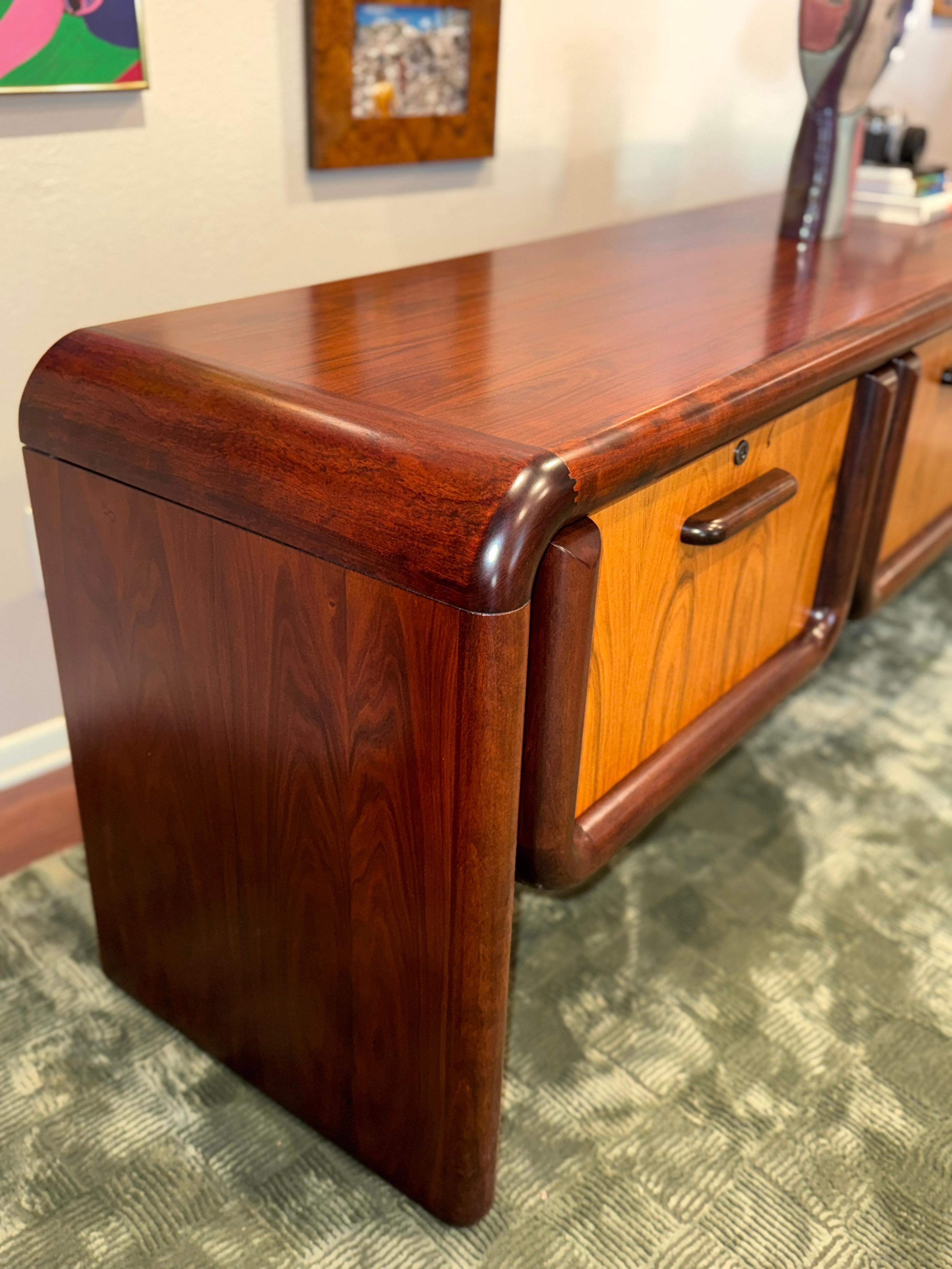 Insanely gorgeous mid century modern Dyrlund “Supreme” credenza in rosewood, circa 1970s.  From the Supreme model line, designed with 2