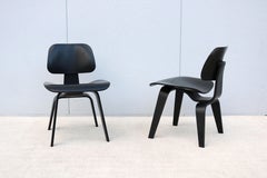 Mid-Century Modern Eames Molded Plywood Dining Chairs Wood Base DCW - a Pair
