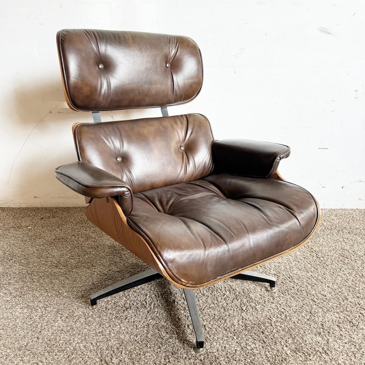 Embrace the iconic Mid Century Modern Eames Style Lounge Chair by Frank Doerner for Plycraft. This piece combines ergonomic comfort with timeless design, featuring high-quality leather and a curved wood frame, perfect for any stylish interior.