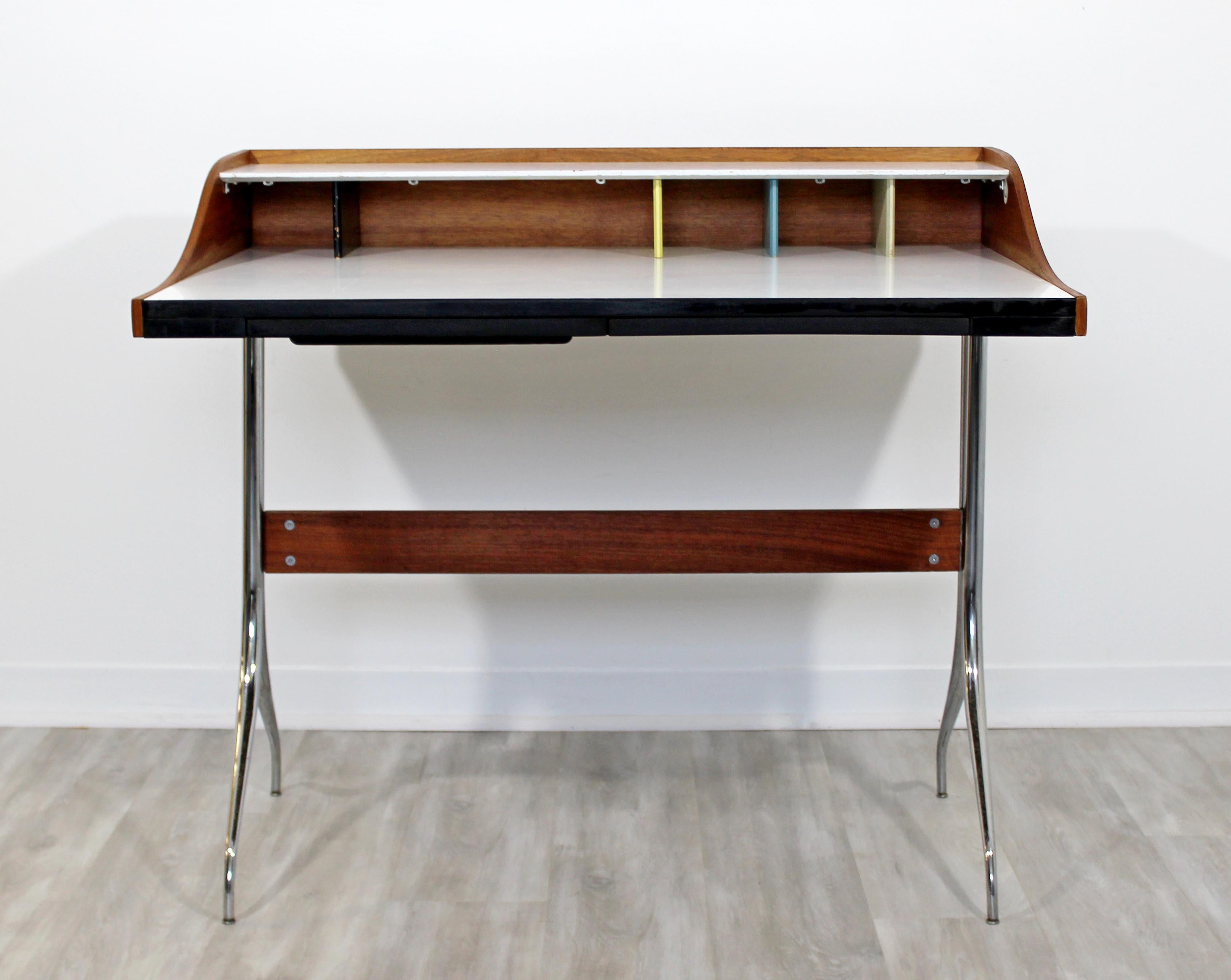 For your consideration is a rare early edition, swag leg desk by George Nelson for Herman Miller, with a single drawer, circa the 1950s. In very good vintage condition. The dimensions are 39