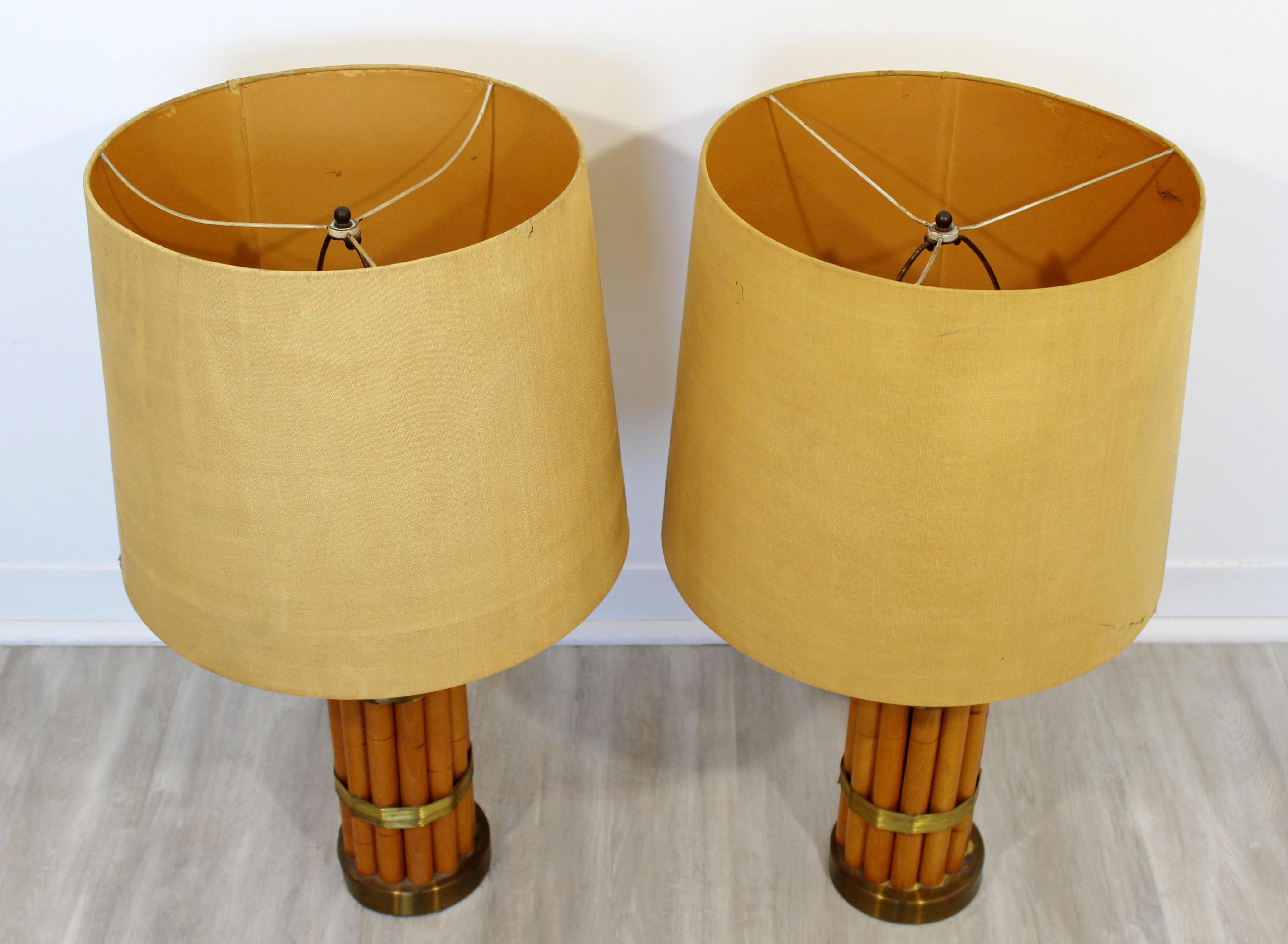 For your consideration is a beautiful pair of bamboo and brass table lamps, by Russell Wright, circa 1950s. In excellent vintage condition. The dimensions of the lamps are 5.5