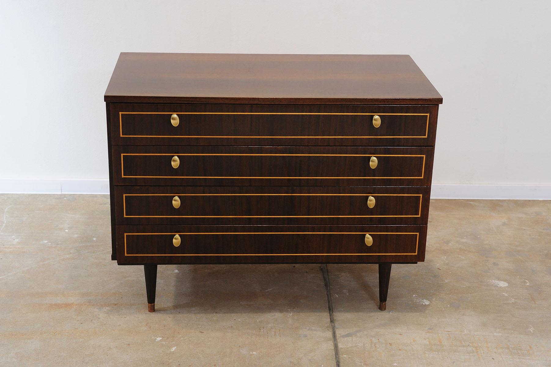 Very interesting mid century modern chest of drawers was made in the former Soviet Union in the 1970´s.

It´s made of wood and plywood. It has rosewood veneer.

The chest is in good Vintage condition, showing signs of age and using.

Height: 75