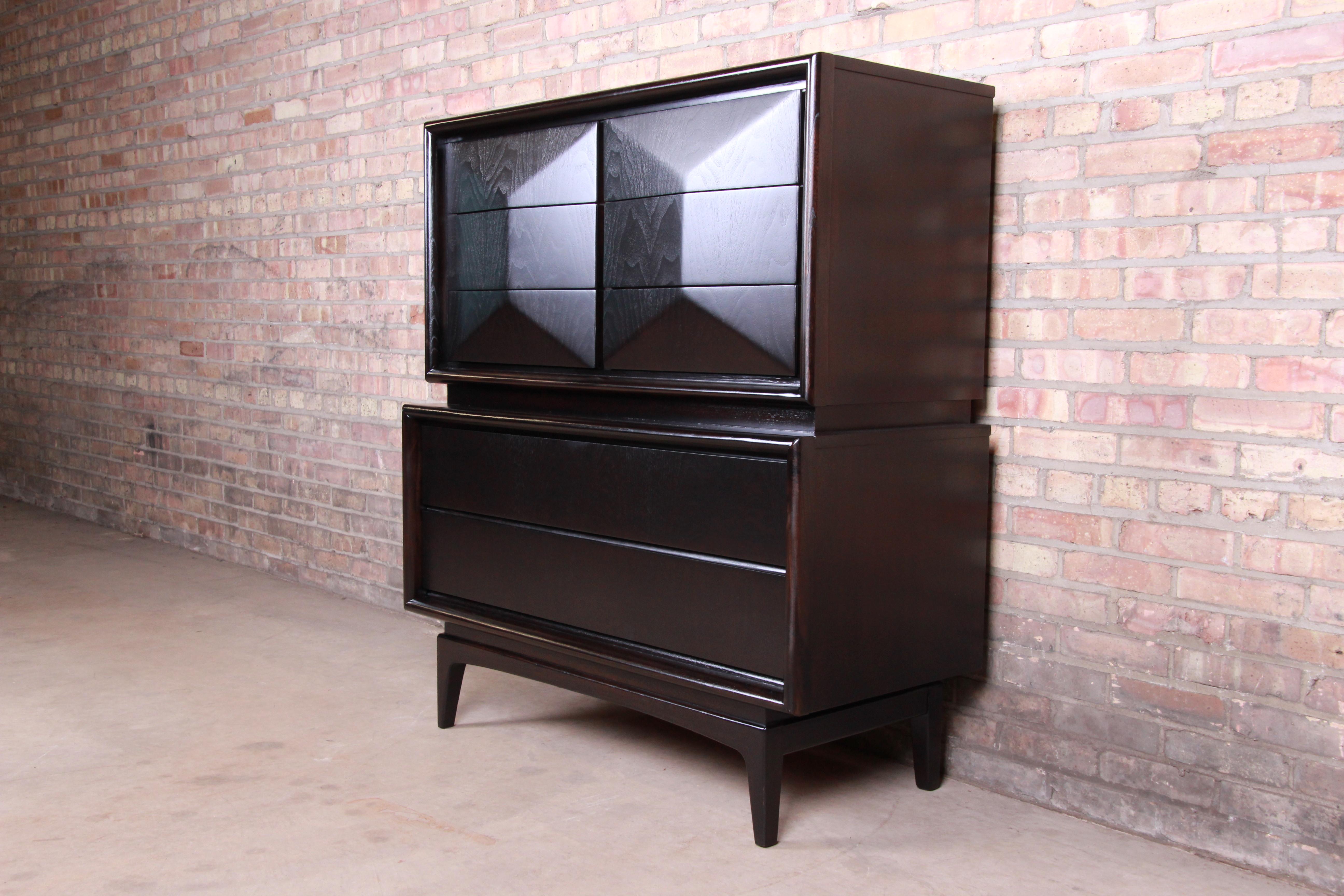 A stunning Mid-Century Modern sculpted walnut ebonized diamond front highboy dresser

In the manner of Vladimir Kagan

By United Furniture Co.

USA, 1960s

Measures: 44.13