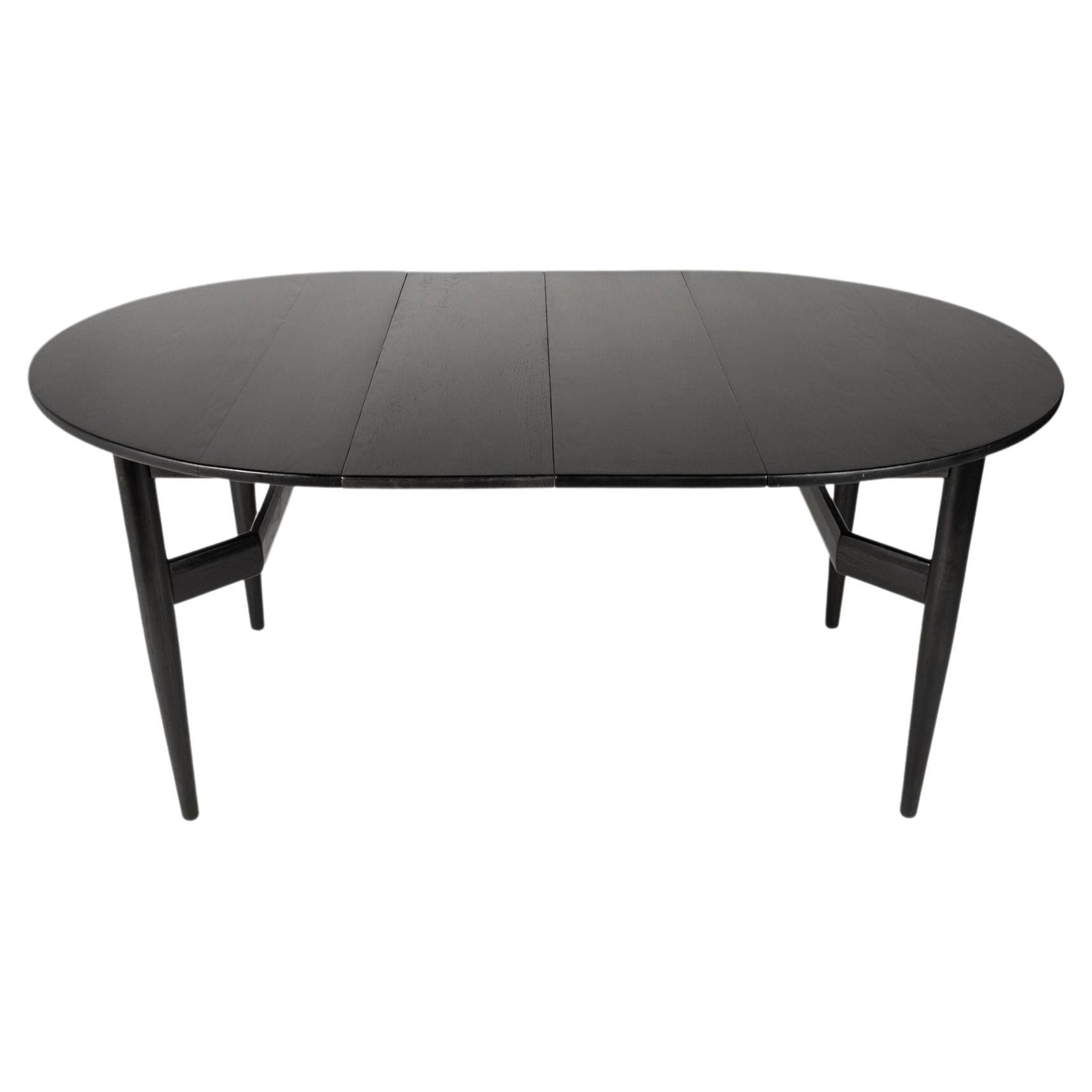 Table de salle à manger à rallonge ébonisée du milieu du siècle avec pied architectural, vers 1960 en vente