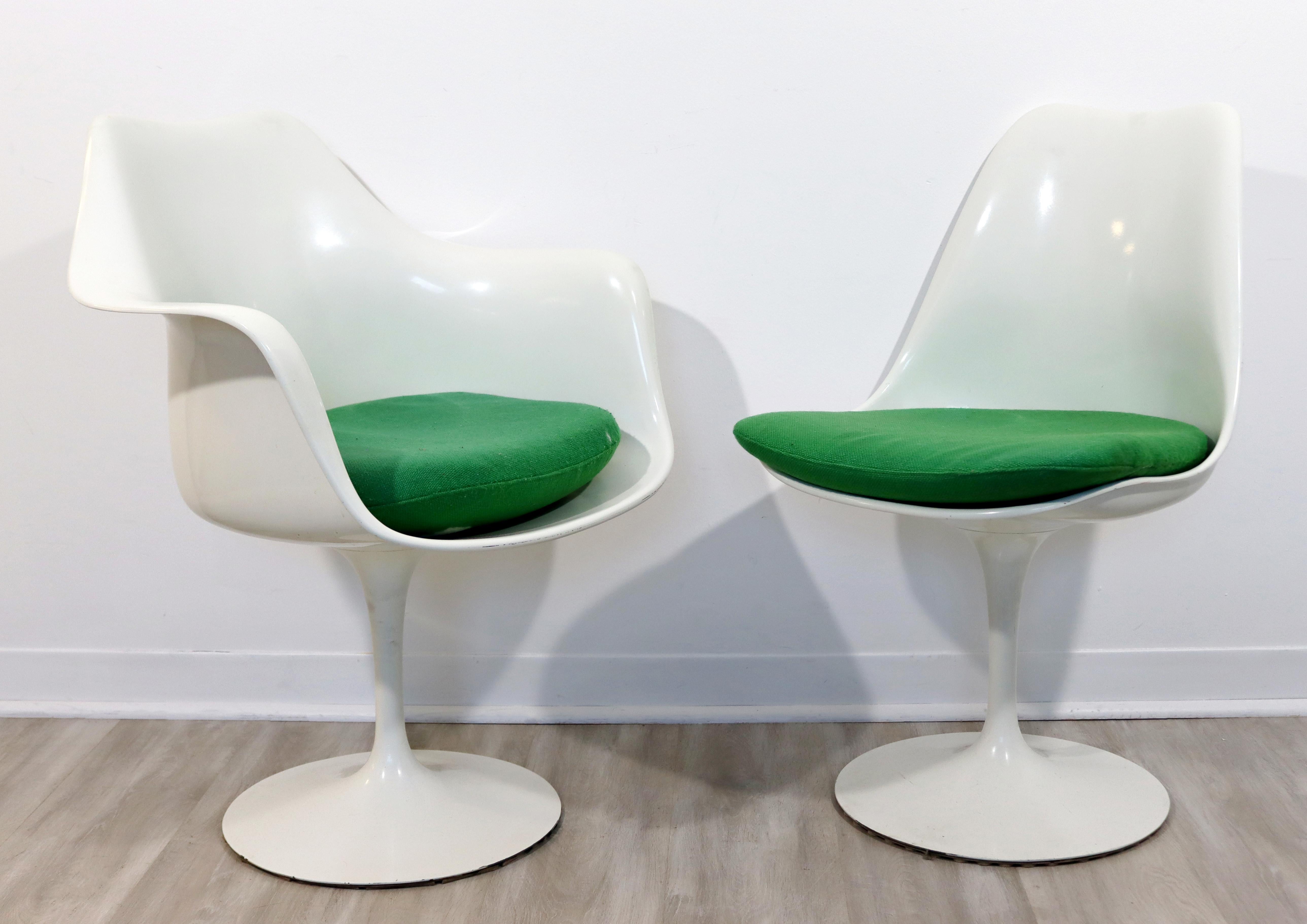 For your consideration is an original, set of six, Tulip dining chairs, including four side and two arm, by Eero Saarinen for Knoll, circa the 1960s. In excellent vintage condition. The dimensions are 19.5