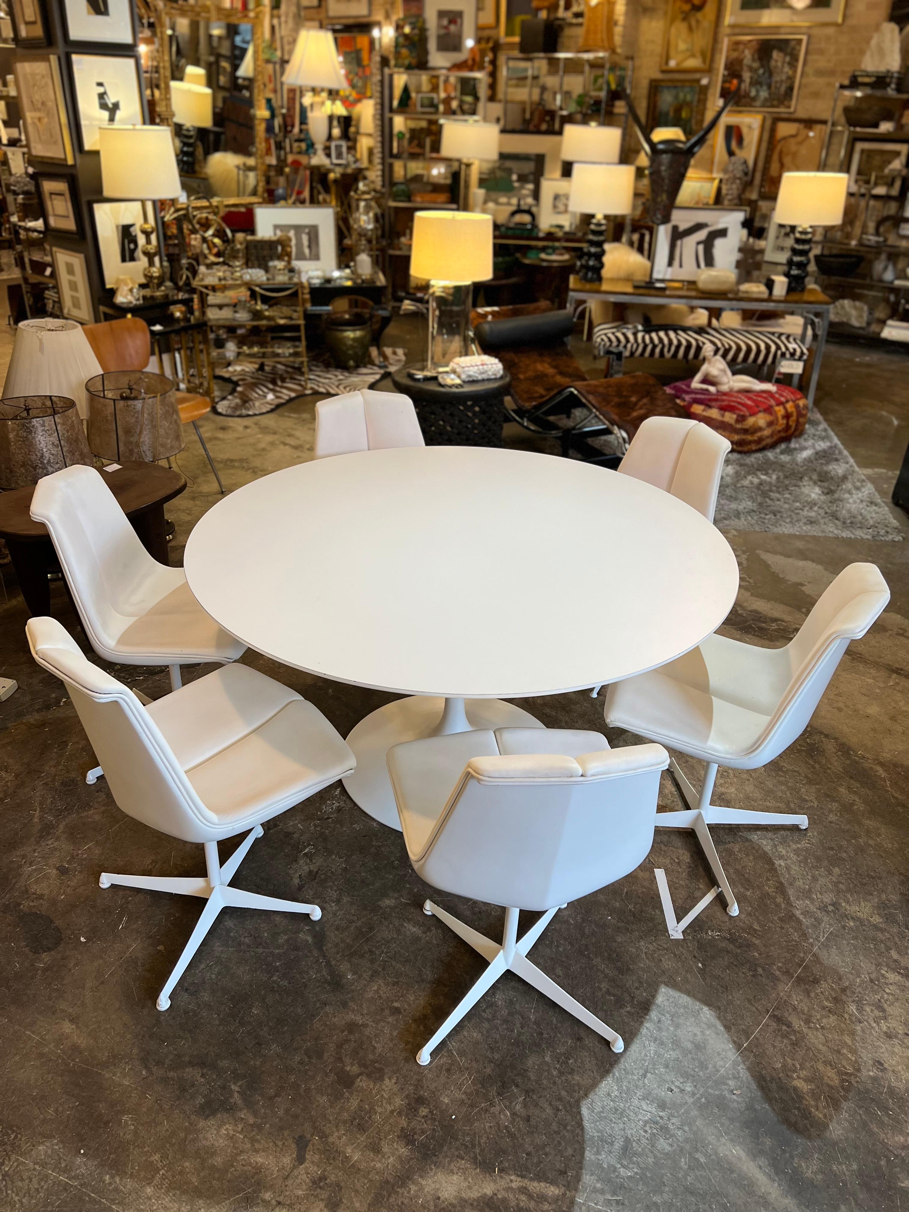 A beautiful original example of a 1960s Saarinen white round laminated Tulip Table together with Richard Schultz 1966 