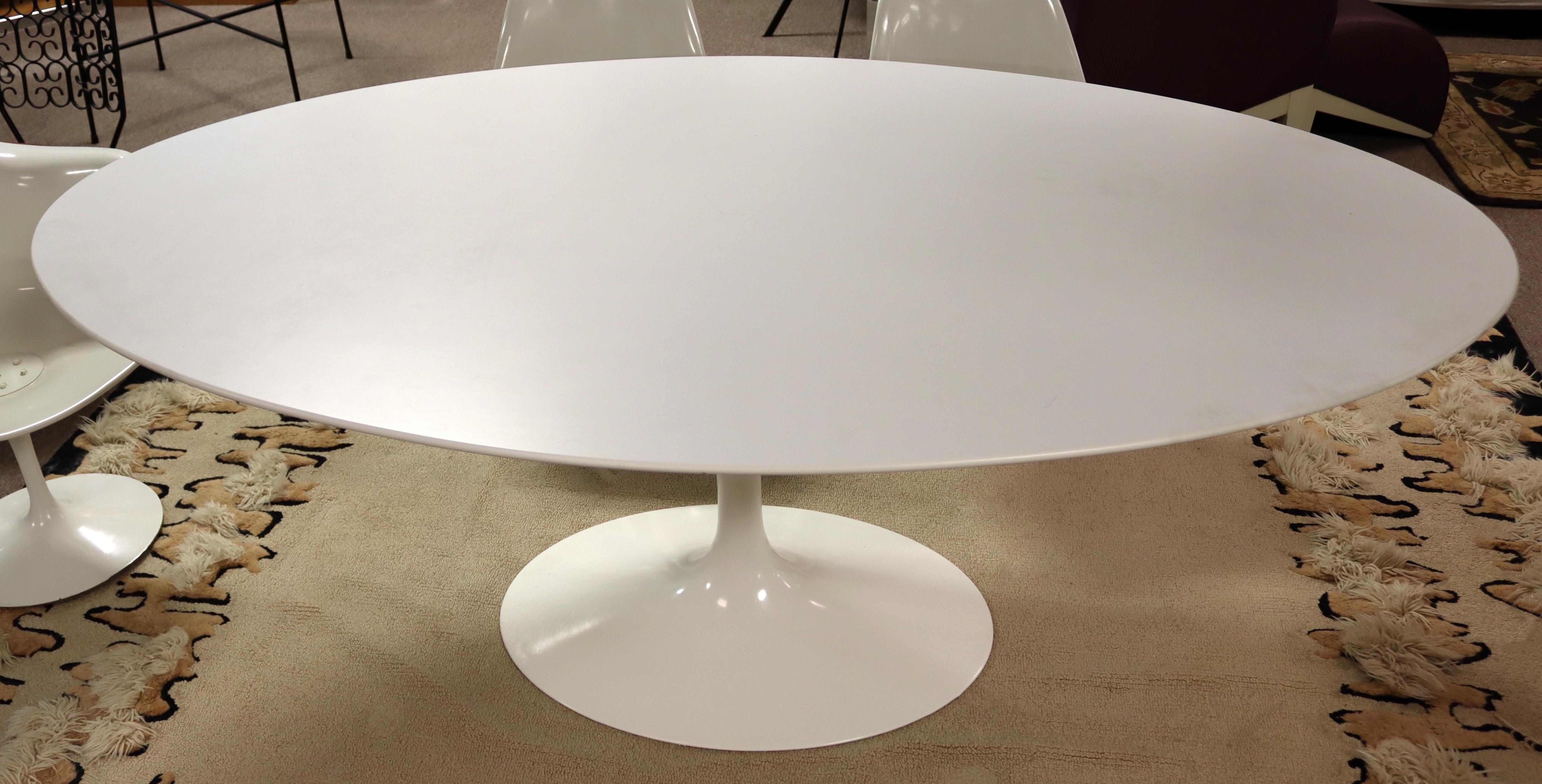For your consideration is an original, signed, Tulip dining table, by Eero Saarinen for Knoll, circa 1957. In excellent vintage condition. The dimensions of the table are 78