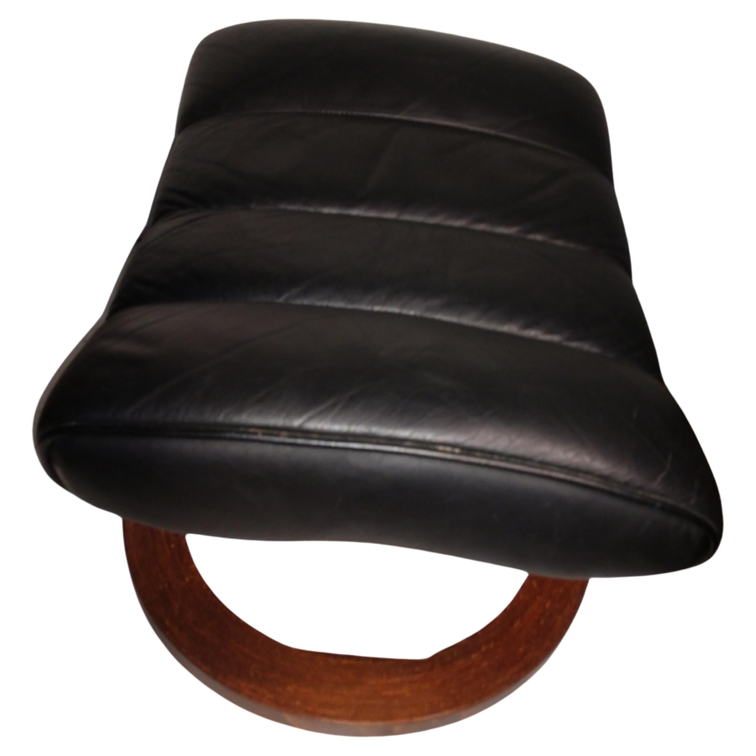 The most comfortable recliner ever made. In excellent vintage condition with minimal wear. Locks in place at so many different points. Extreme point is 42 in length. Ottoman dims are 21.25W x 18.25D x 15.5H, it is fixed does not swivel.