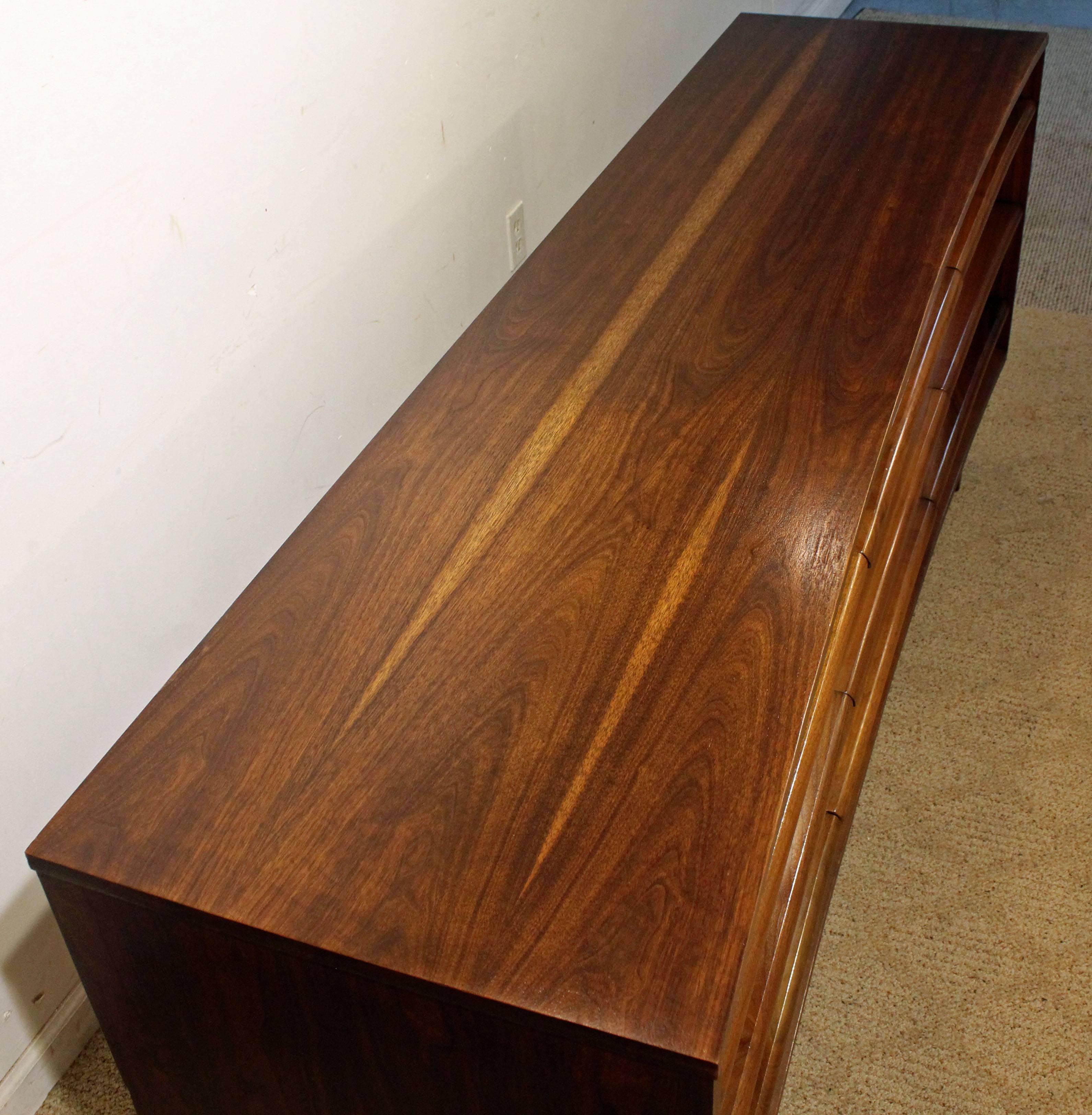 American Mid-Century Modern Elongated Concave-Front Walnut Credenza