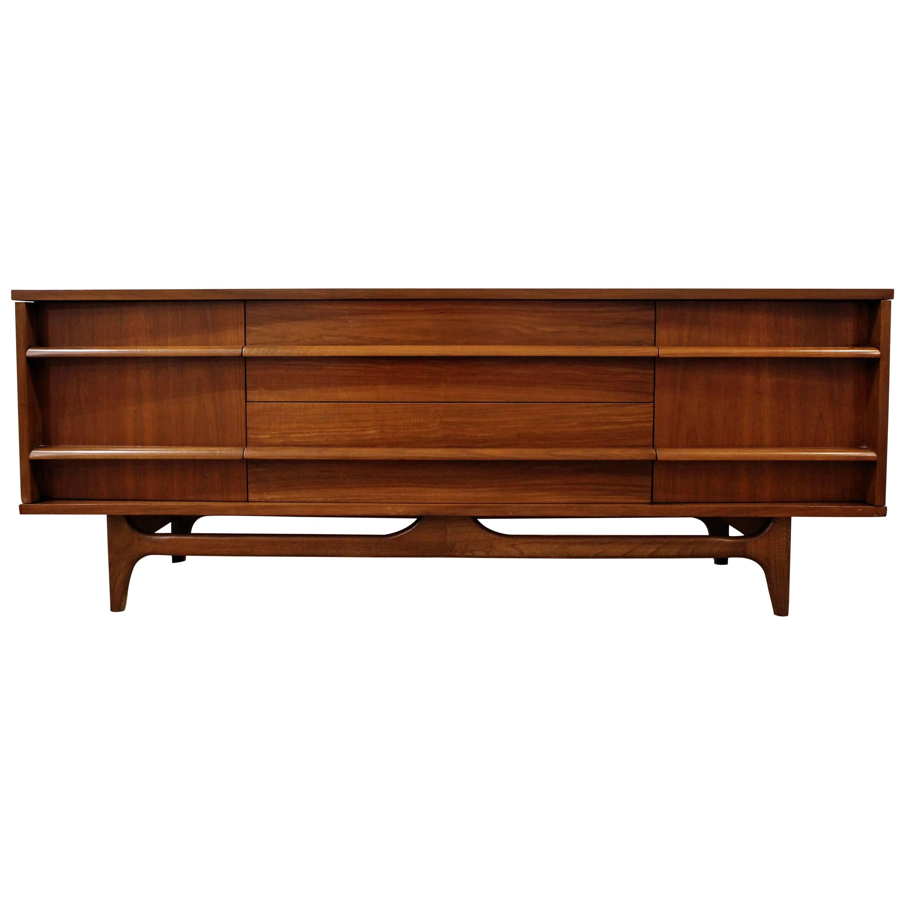 Mid-Century Modern Elongated Concave-Front Walnut Credenza at 1stDibs