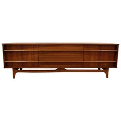 Mid-Century Modern Elongated Low Concave-Front Walnut Credenza