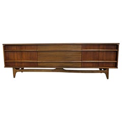 Mid-Century Modern Elongated Low Concave-Front Walnut Credenza