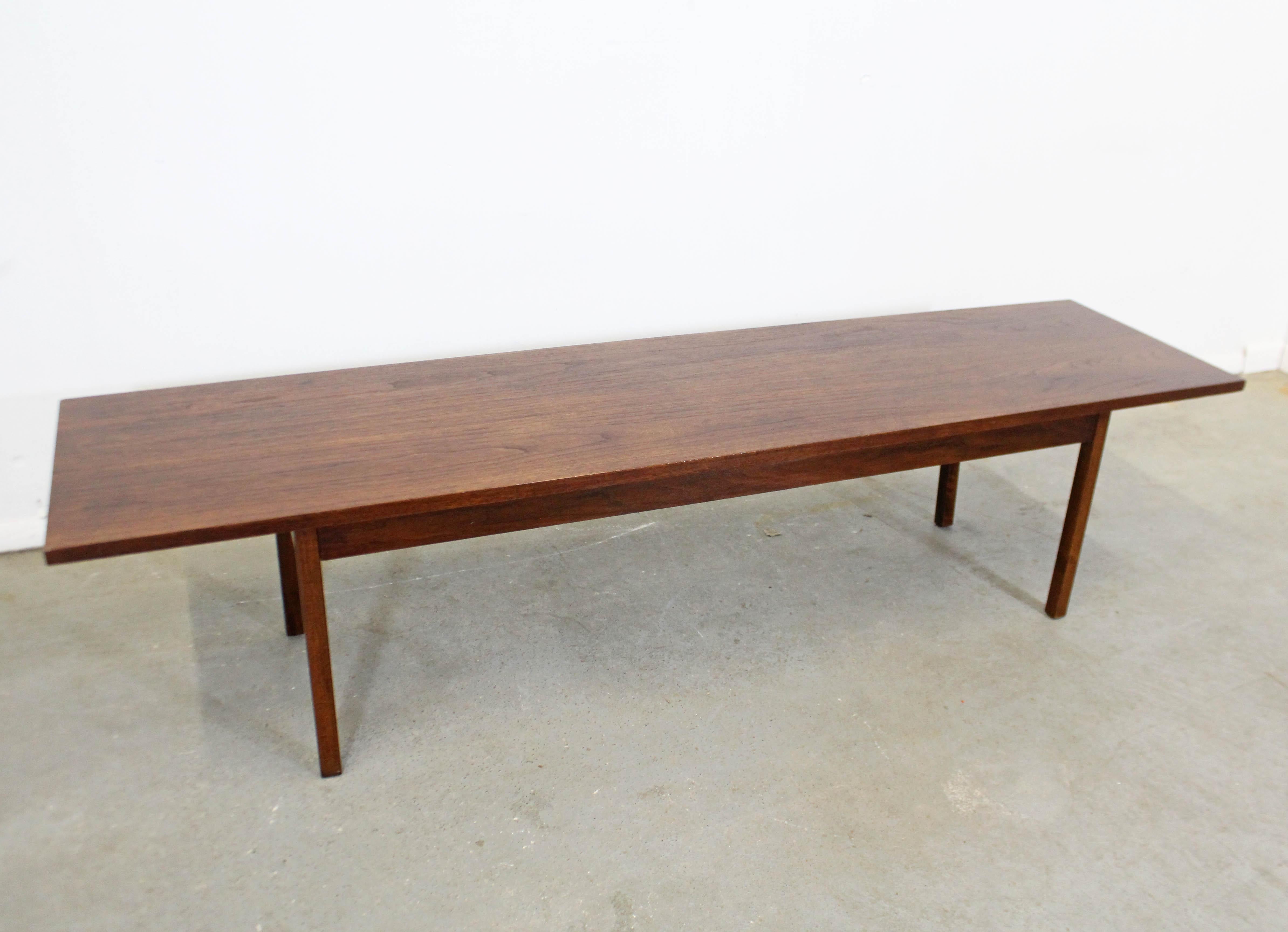 What a find. Offered is a vintage Mid-Century Modern walnut coffee table. It has a nice look and simple lines. Has been refinished and is in good condition with minor surface wear/scratches. It is structurally sound and stabile. It is not