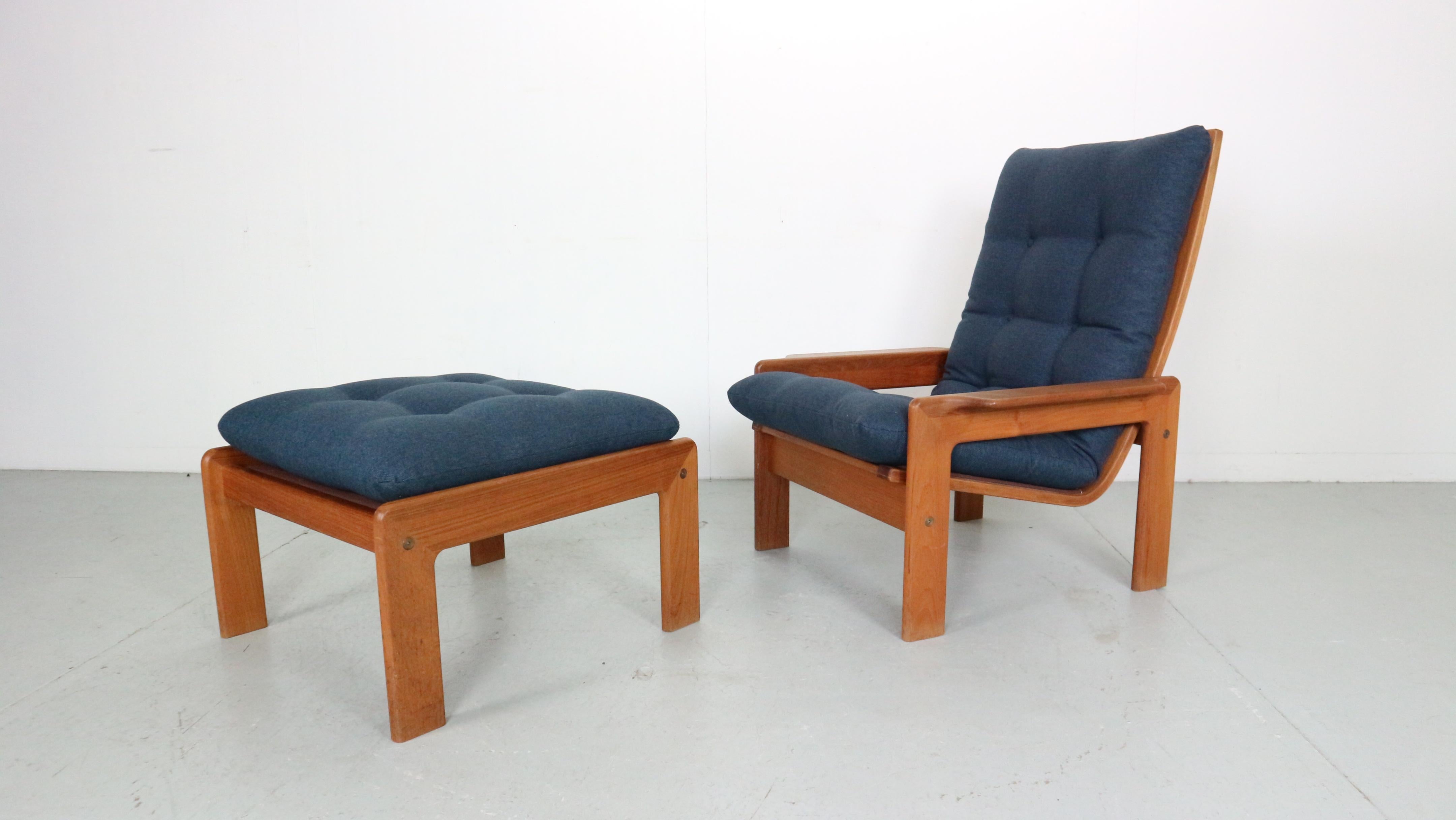 Stylish Vintage Danish Modern easy chair and ottoman, designed and manufactured by EMC Møbler, 1960's period Denmark.

This comfortable, solid teak chair features the typical midcentury Denmark organic design and new blue upholstery. 
The design